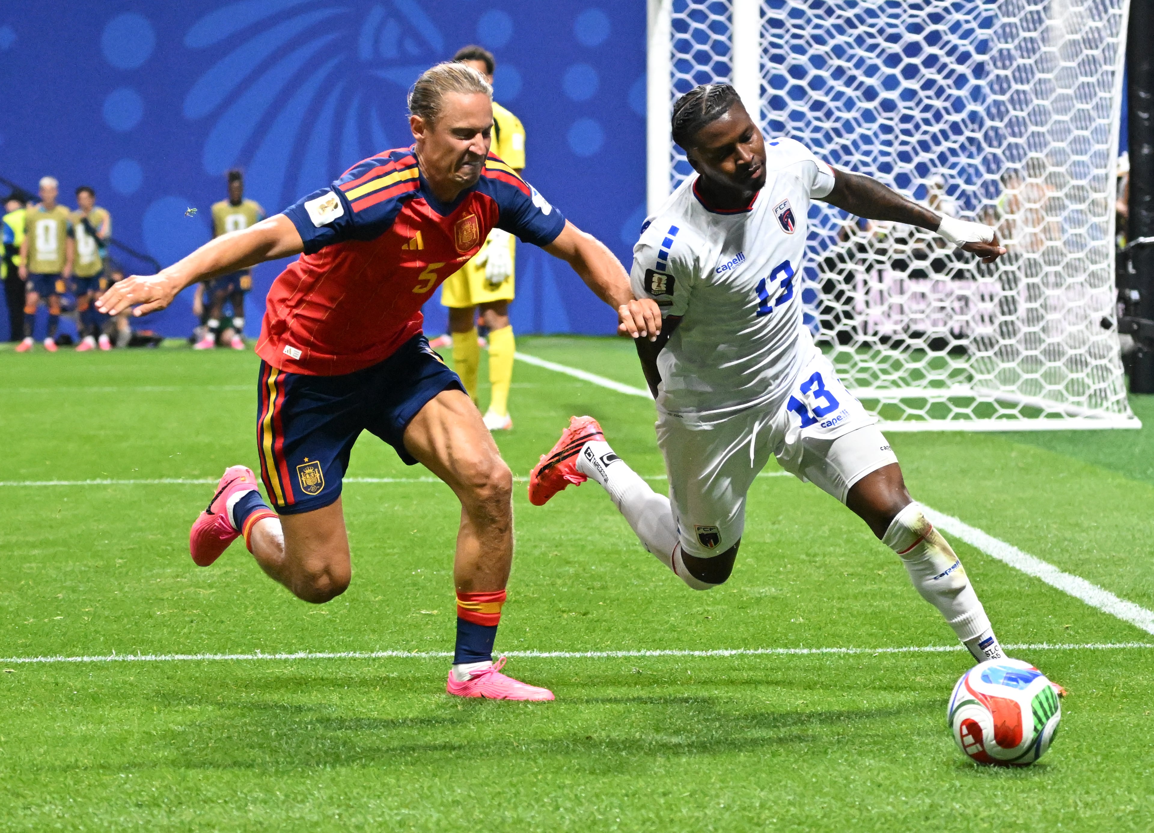 Spain's Marcos Llorente (5) and Cape Verde's Sidny Lopes Cabral (13) battle for ball during second half of Spain vs. Cape Verde Group H match at Atlanta Stadium (Mercedes-Benz Stadium) on Monday, June 15, 2026. (Hyosub Shin/AJC)