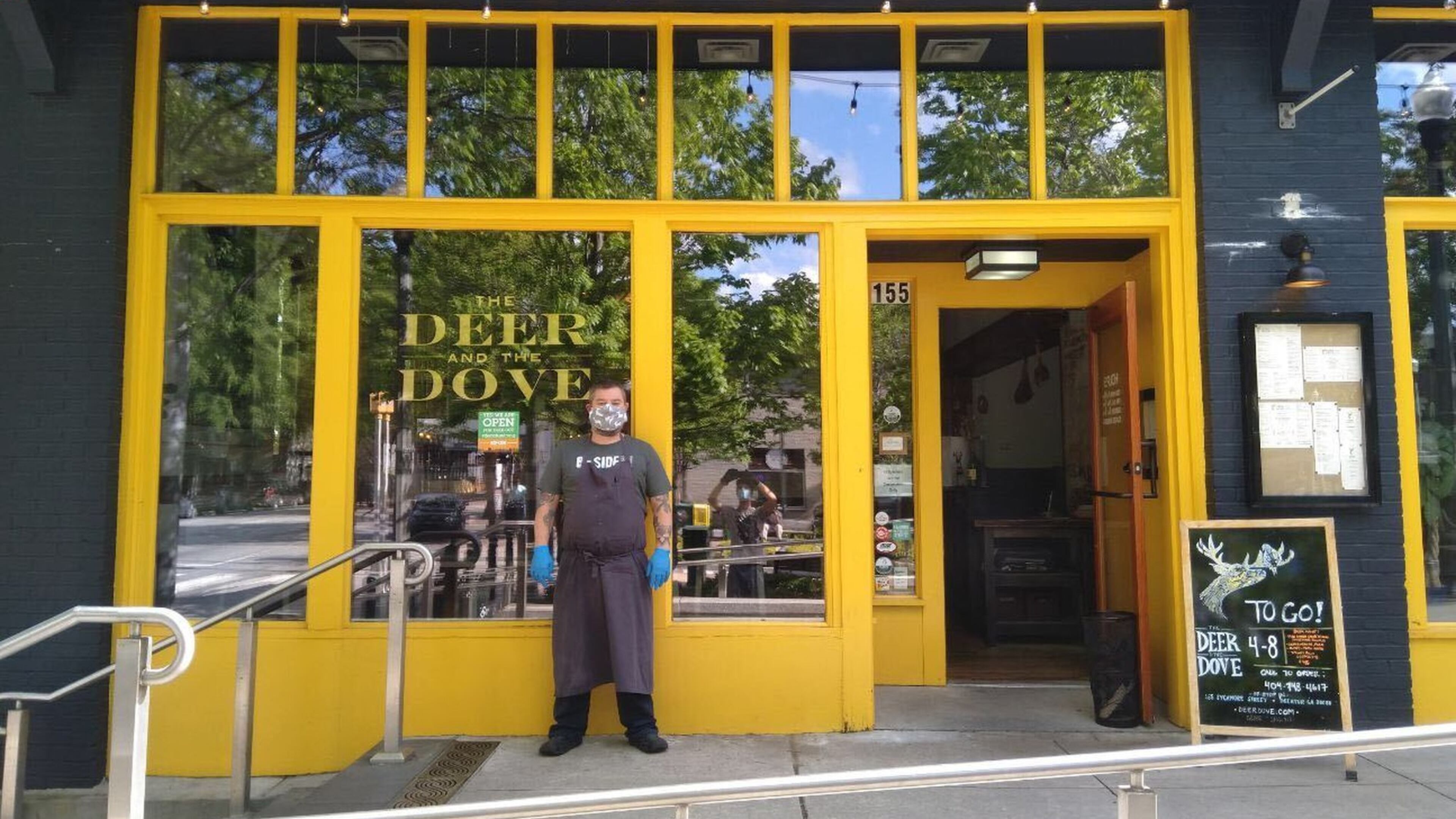 Terry Koval, chef and co-owner of the Deer and the Dove and B-Side on Decatur Square, has kept his restaurants open with takeout service during the COVID-19 pandemic. The work schedule, though, is “brutal,” he said. LIGAYA FIGUERAS / LIGAYA.FIGUERAS@AJC.COM