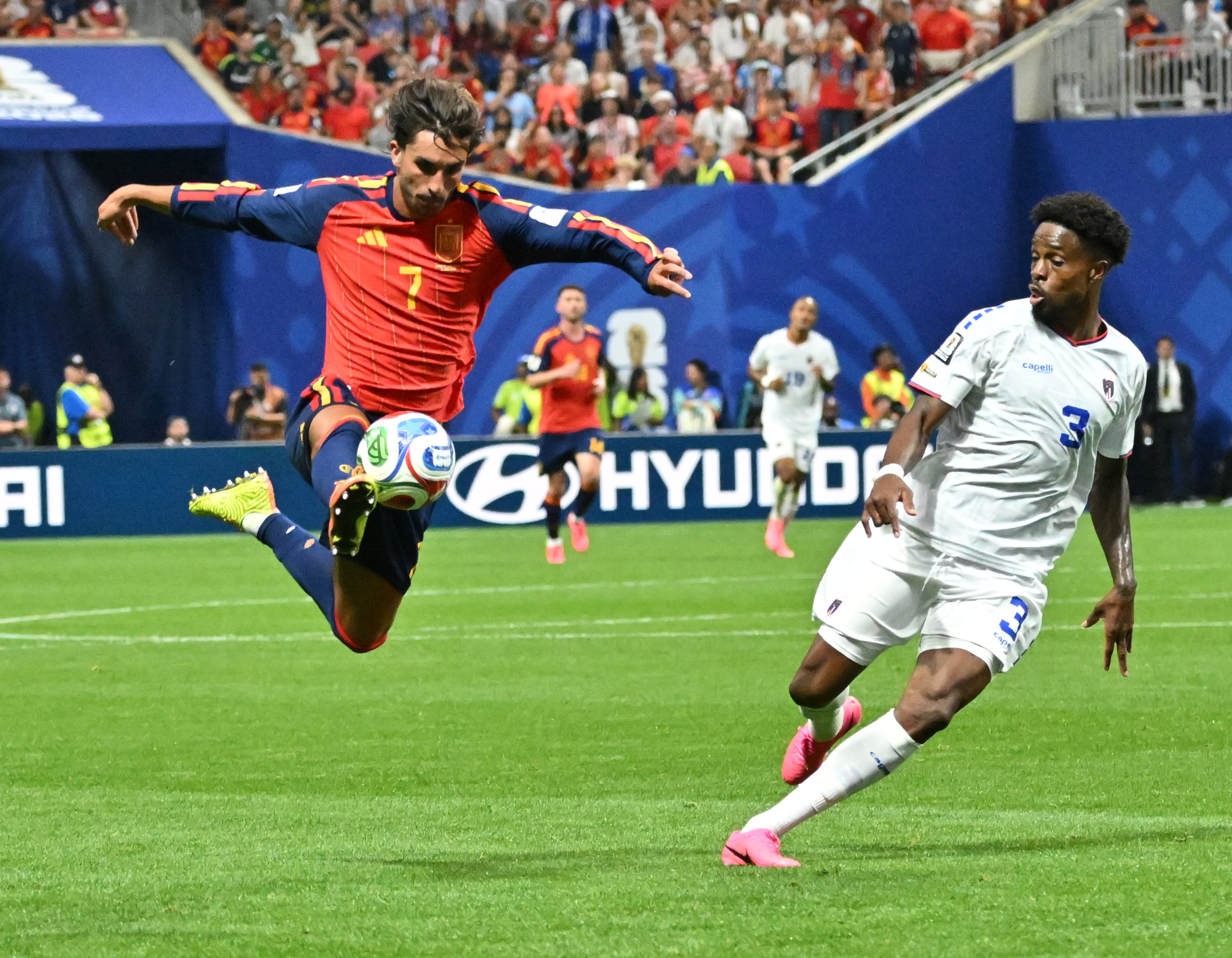 Spain's Ferran Torres (7) and Cape Verde's Diney Borges (3) battle for ball during second half of Spain vs. Cape Verde Group H match at Atlanta Stadium (Mercedes-Benz Stadium) on Monday, June 15, 2026. (Hyosub Shin/AJC)