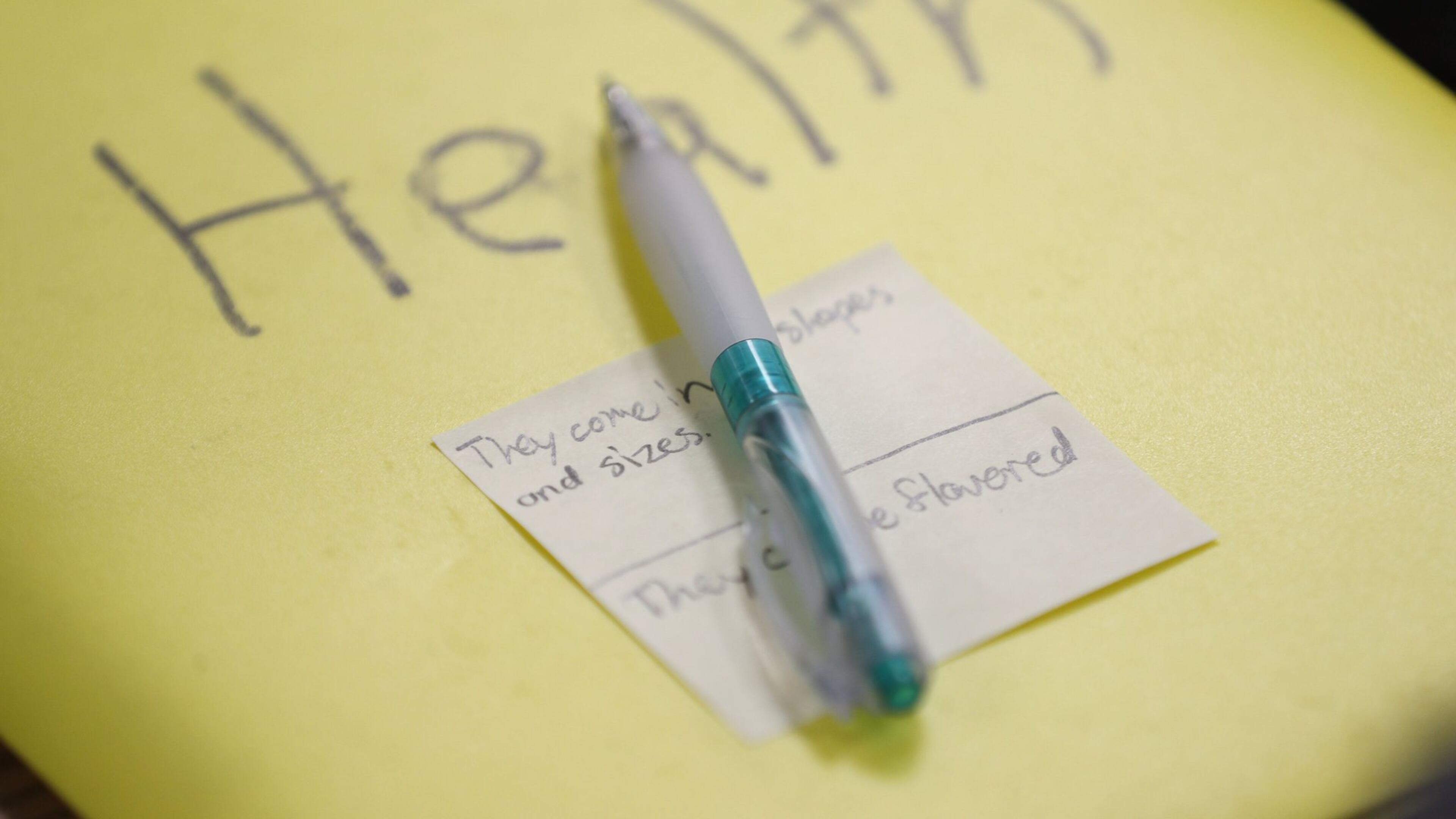 In this 2019 file photo, the health notebook of one of the students, with a sticky note with vaping facts written on it. Les Meenan, the health teacher at Webb Bridge Middle School, has had to modify his unit on alcohol and tobacco to increase the focus on vaping. Bob Andres / robert.andres@ajc.com