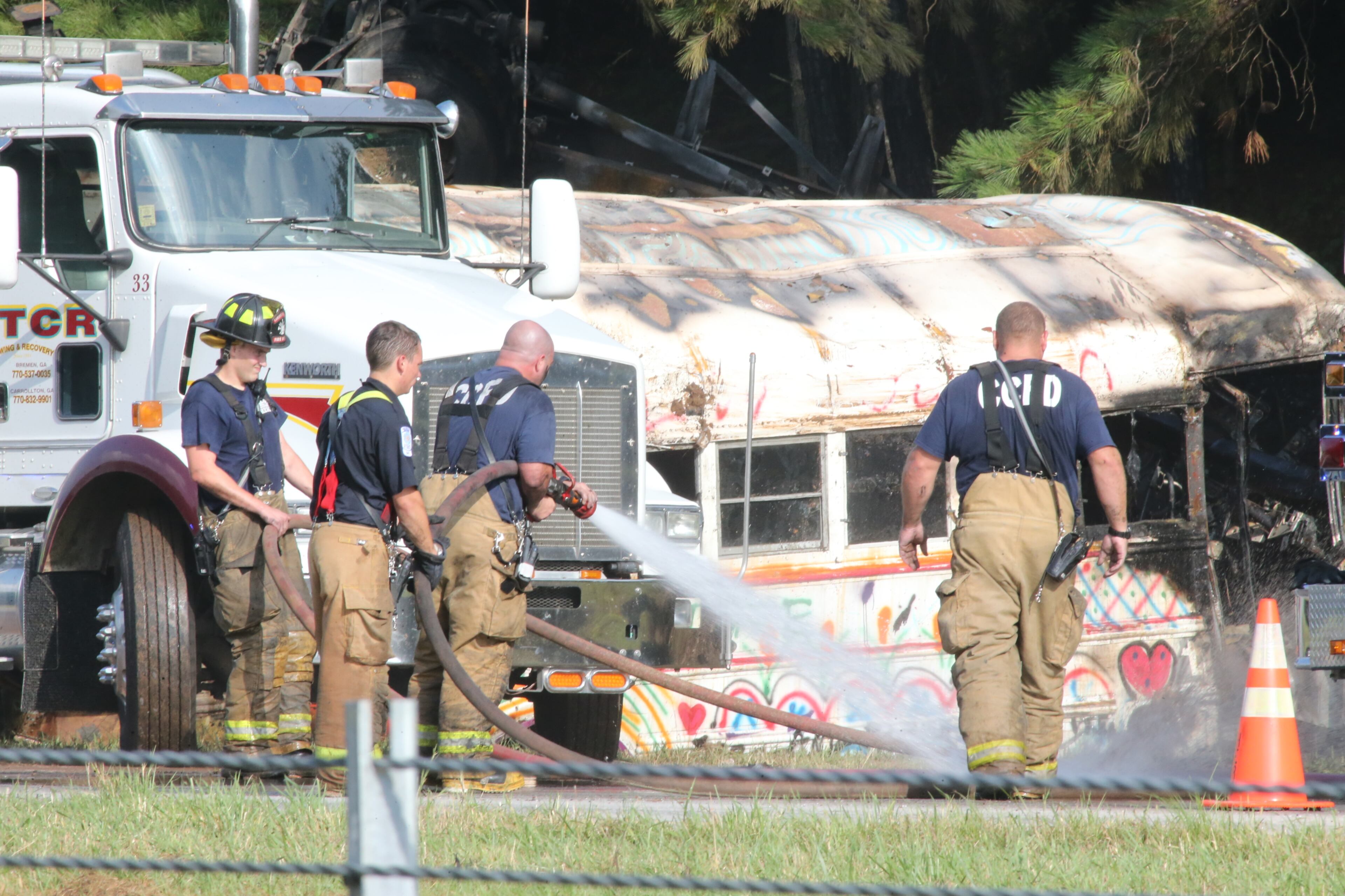 A left westbound lane reopened to traffic just before 8:30 a.m., but the Georgia Department of Transportation predicted it would be 10 a.m. before the scene is cleared. Eastbound lanes are open. JOHN SPINK/JSPINK@AJC.COM