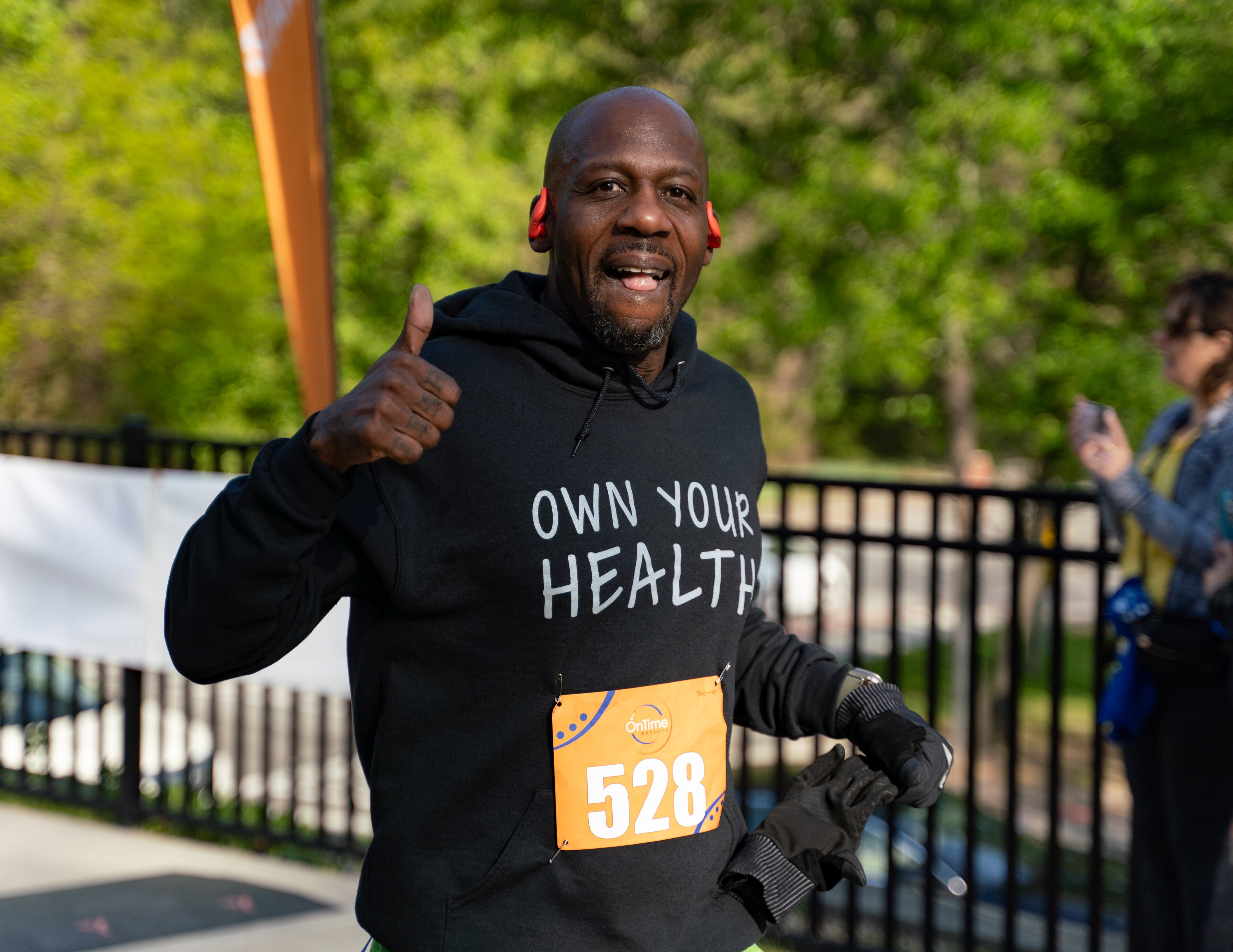 Thomas Chambless crosses the finish line at the Daffodil Dash at Brook Run Park in Dunwoody on Sunday, April 7, 2024. (Ben Hendren for The Atlanta Journal-Constitution)