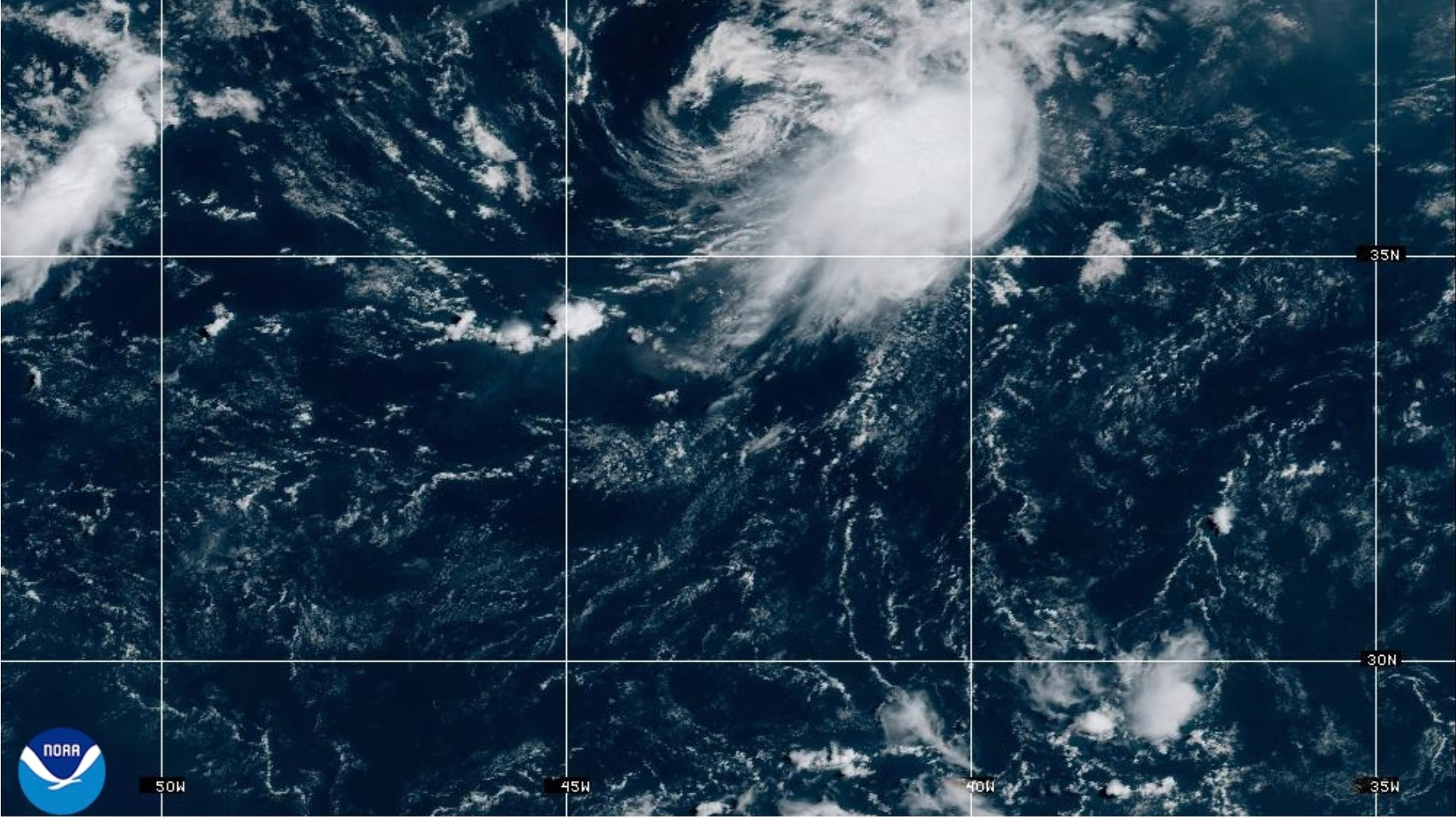 This NOAA satellite image taken at 11:21 a.m. EST on Wednesday, Aug. 12, 2026, shows Tropical Storm Cristobal in the Atlantic Ocean. (NOAA via AP)