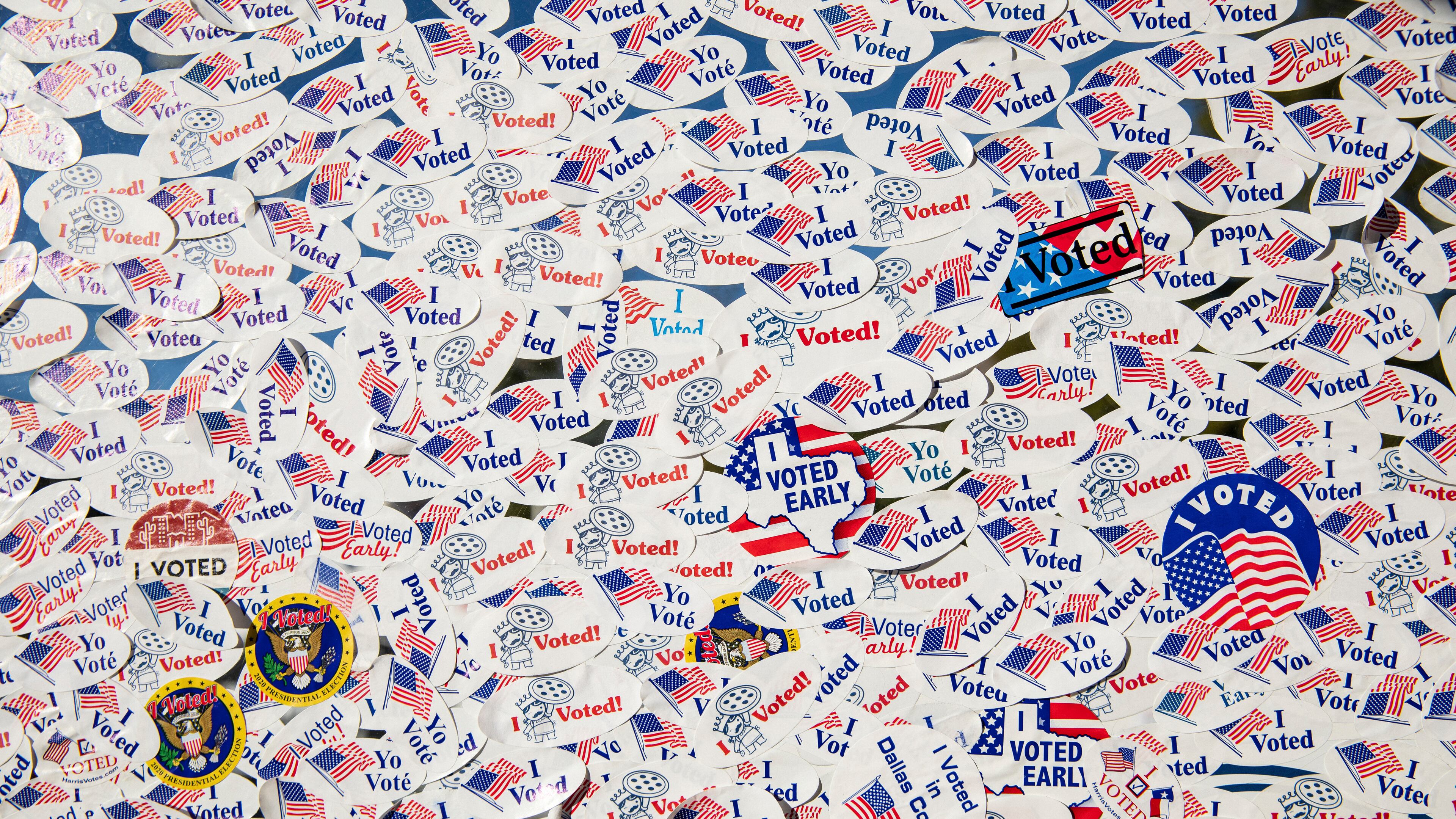 FILE — "I Voted" stickers cover a plexiglass sheet at Home Slice Pizza, a restaurant offering a free slice of pizza to anyone who shows their "I Voted" sticker, in Austin, Tex., on Oct. 31, 2020. Despite the stop-the-steal movement, the Supreme Court’s decision to overturn Roe v. Wade and the numerous investigations facing former President Donald Trump, President Joe Biden and Trump are still tied, each at 43 percent, among registered voters in the first Times/Siena poll of the 2024 election cycle.(Tamir Kalifa /The New York Times)