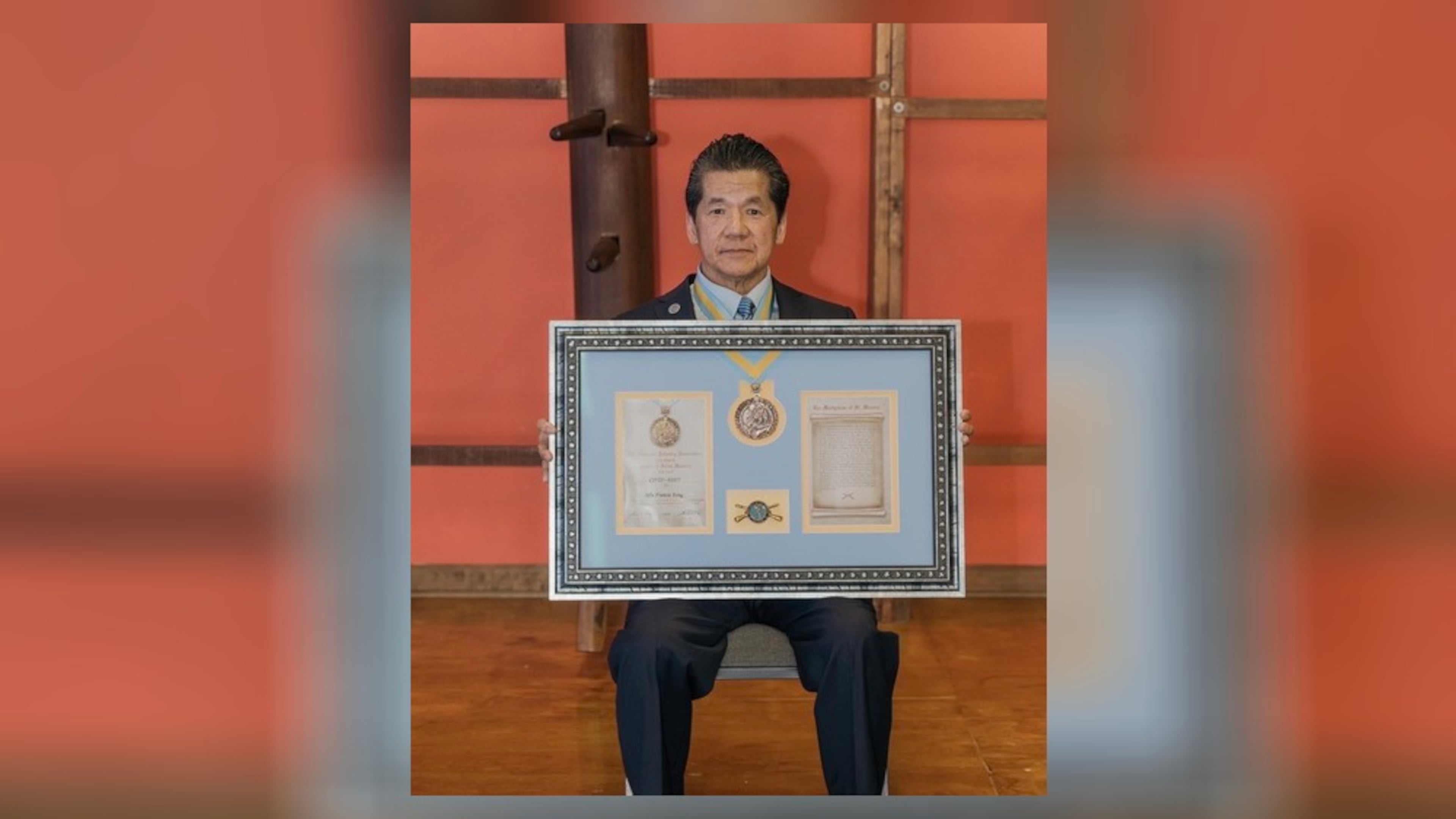 The National Infantry Association presented The Order of Saint Maurice Award medallion for civilians to Francis Fong, 73, on Saturday at his martial arts school. Courtesy Tracey Fong