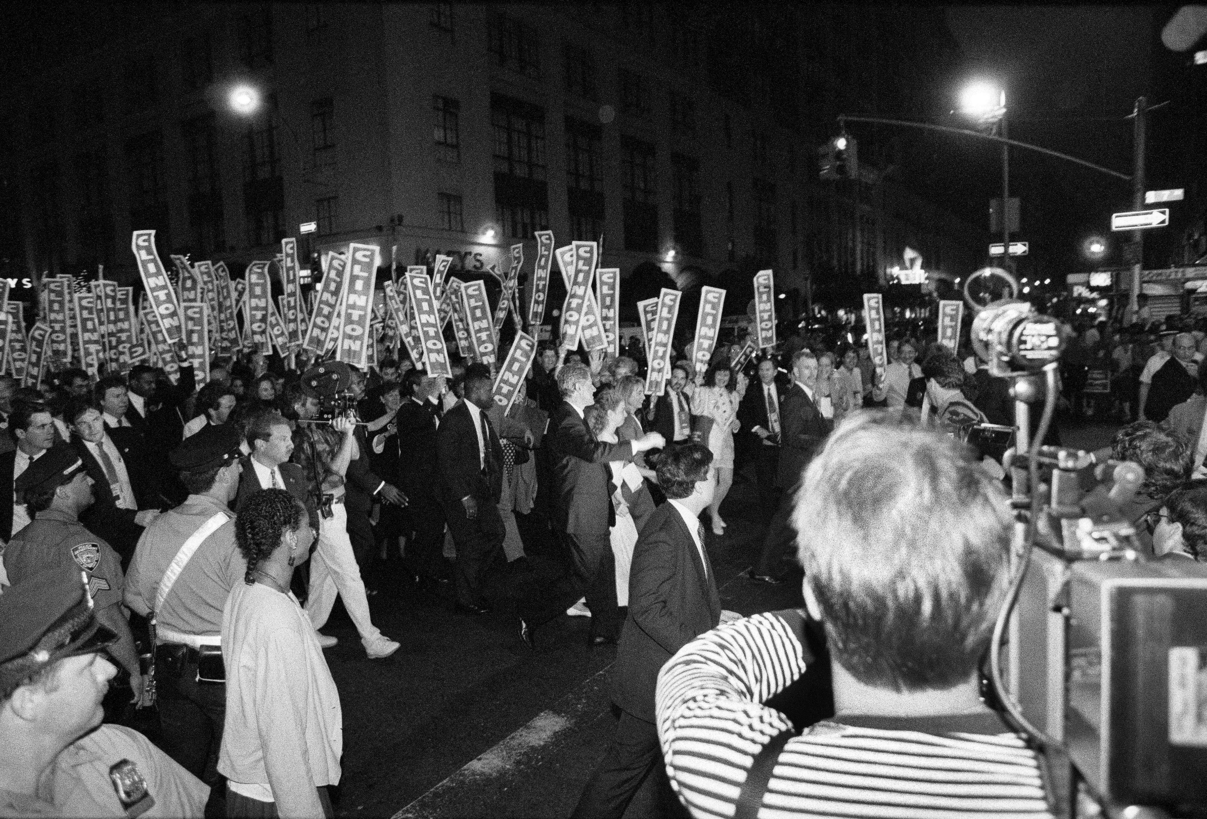 Bill and Hillary Clinton with their daughter, Chelsea, marching during the Democratic National Convention in New York, July 15, 1992. A political fixture for a generation, Clinton faces the task at this week’s convention of persuading parts of the electorate to take another look at her. (James Estrin/The New York Times)