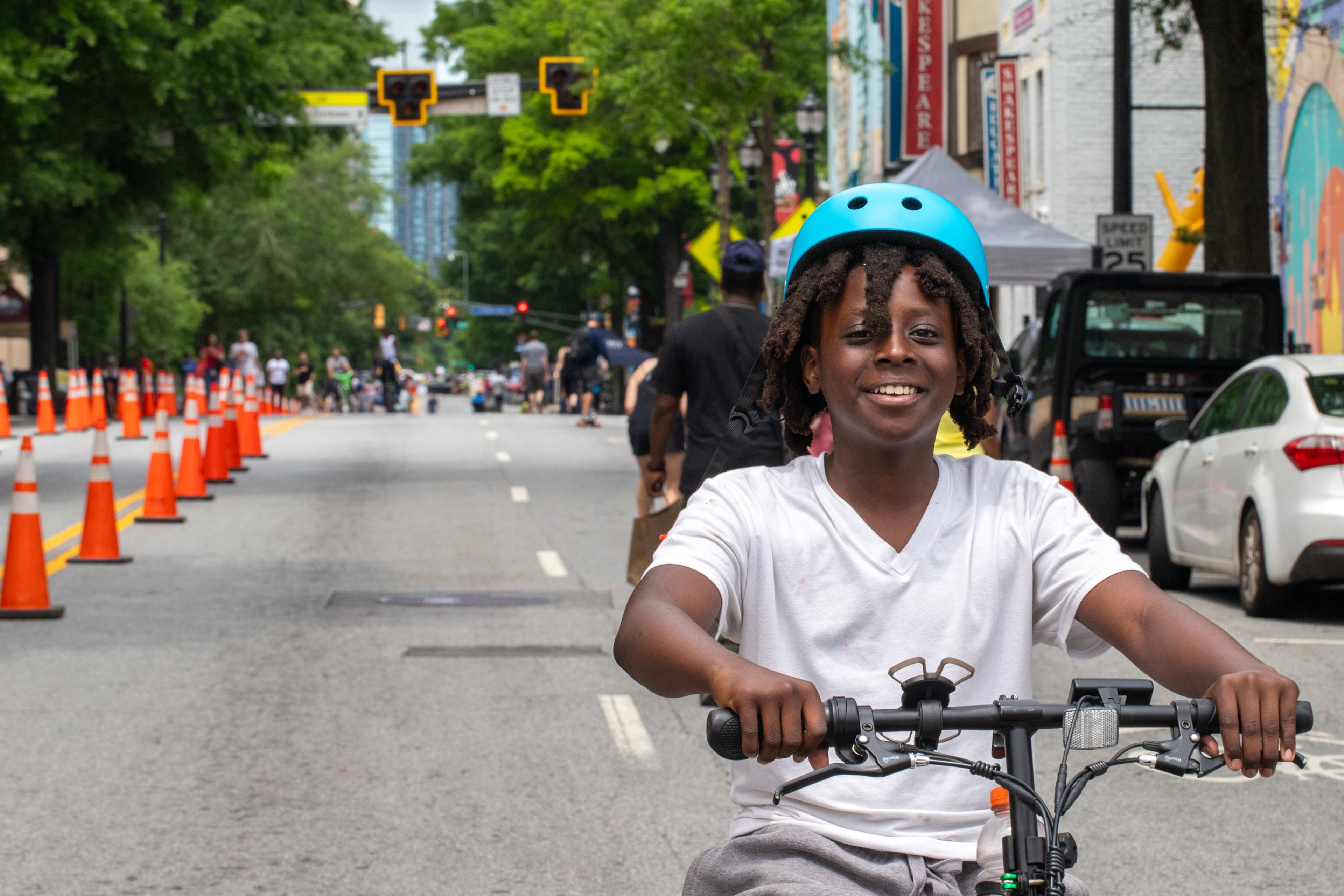 Atlanta Streets Alive returned this weekend to convert the busy, congested Peachtree Street into a community block party. While a stretch of the street is shut down to traffic, 11-year-old Aiden Jones rides Sunday, April 27, 2025. (Jenni Girtman for The Atlanta Journal-Constitution)