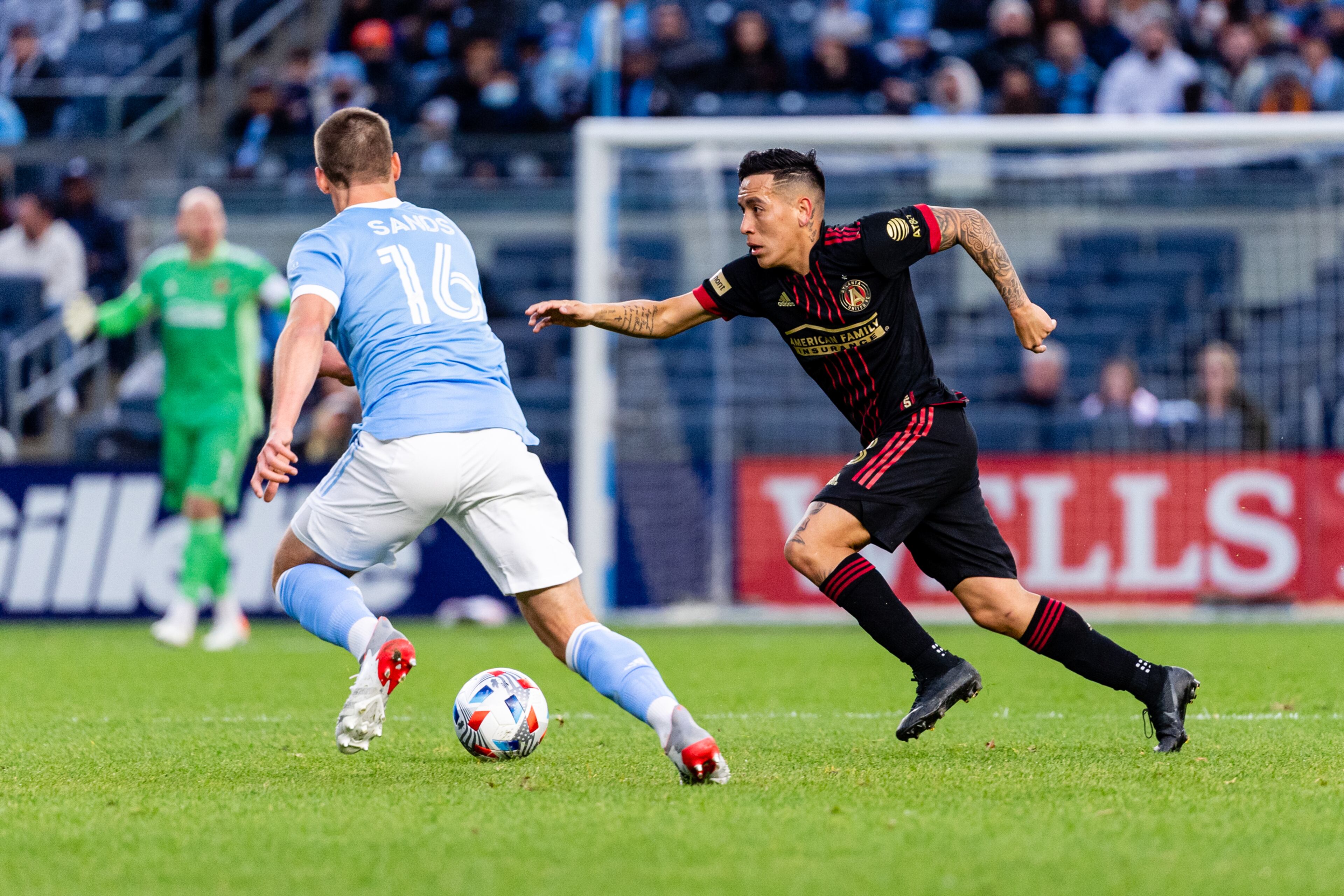 Atlanta United midfielder Ezequiel Barco #8 dribbles during the round one playoff match against New York City FC at Yankee Stadium in Bronx, New York on Sunday November 21, 2021. (Photo by Dakota Williams/Atlanta United)