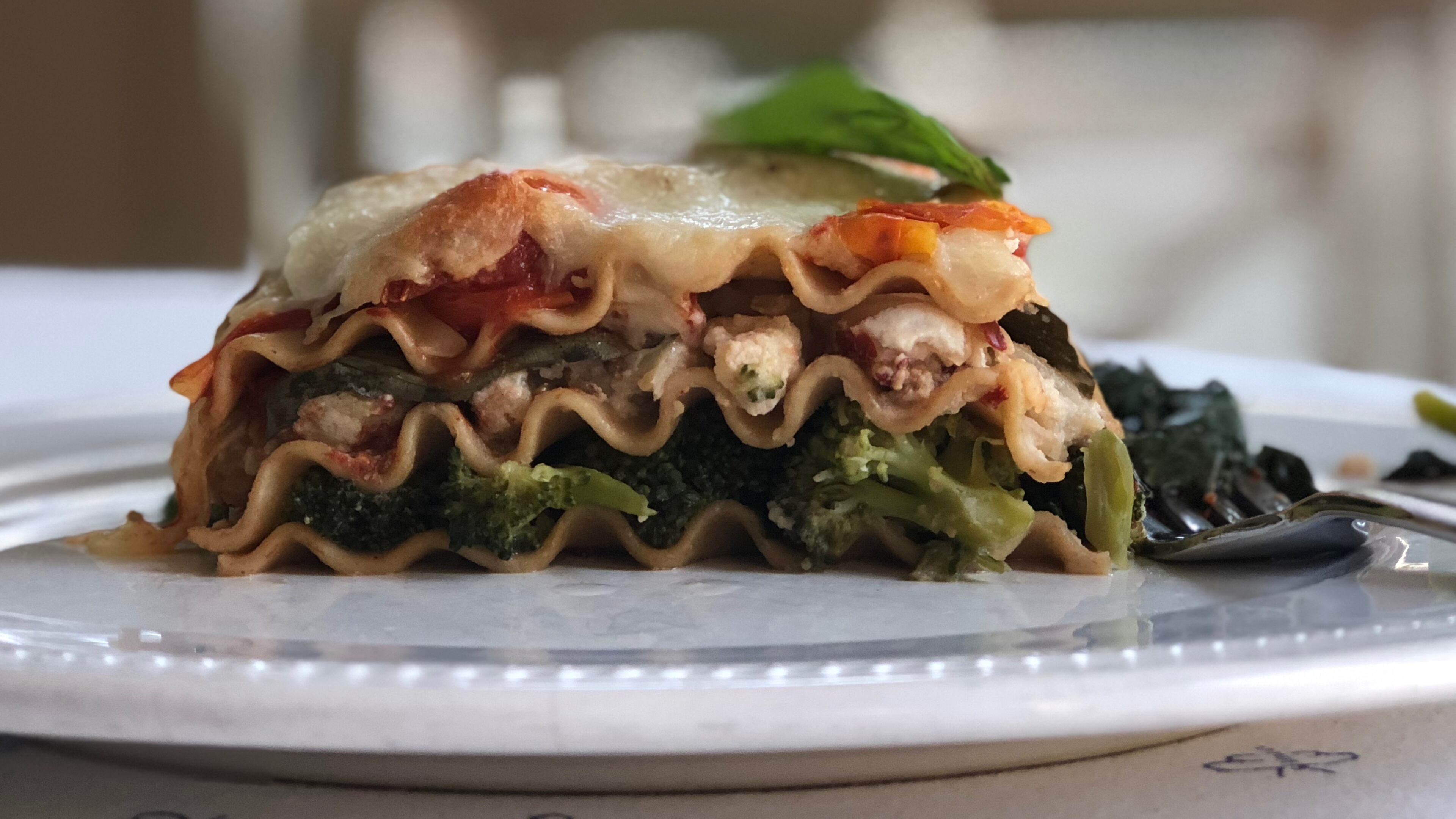 This veggie-packed dish offers memory-making flavors with only half the cheese of traditional lasagnas. PHOTO CREDIT: Kellie Hynes