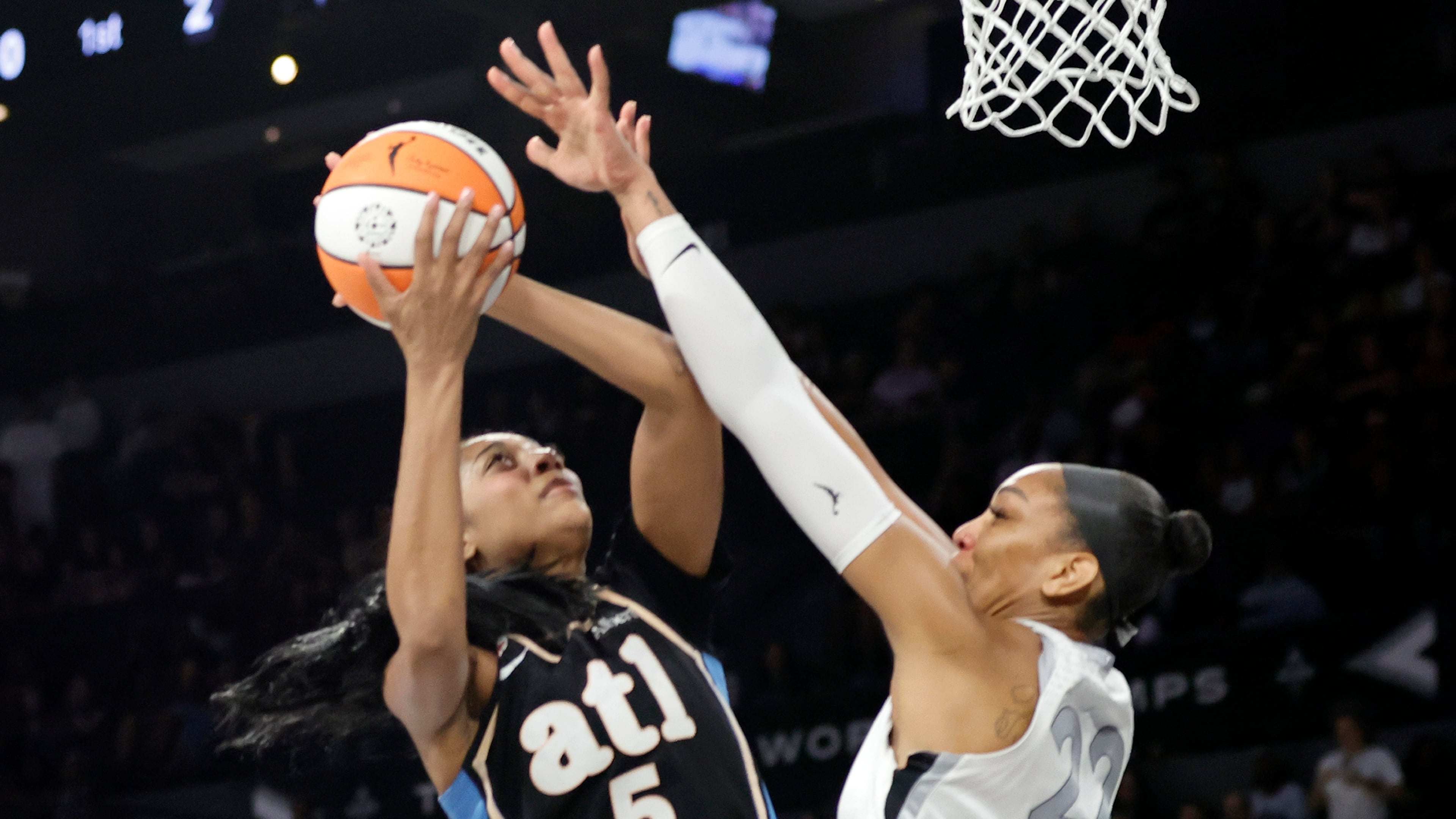 Dream All-Star Angel Reese (left) shoots against Aces center A’ja Wilson on Tuesday, Aug. 18, 2026, in Las Vegas. Reese made it hard for Wilson to get to her sweet spots with the ball, AJC columnist Michael Cunningham writes. (Steve Marcus/Las Vegas Sun via AP)
