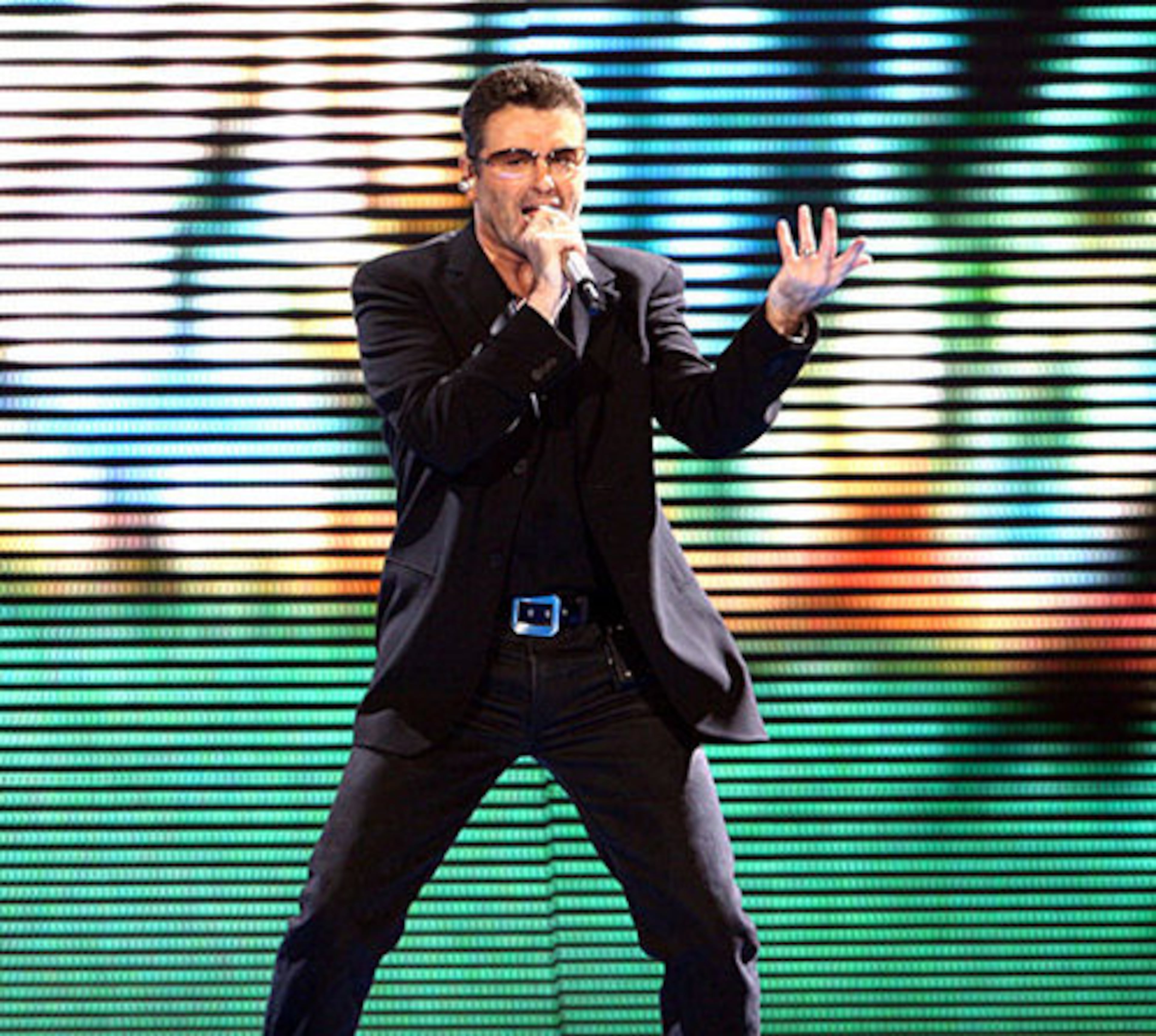 George Michael sings 'Fastlove,' a 1996 single that was Michael's last Top 10 song in the U.S. The song rose to No. 1 in Britain.