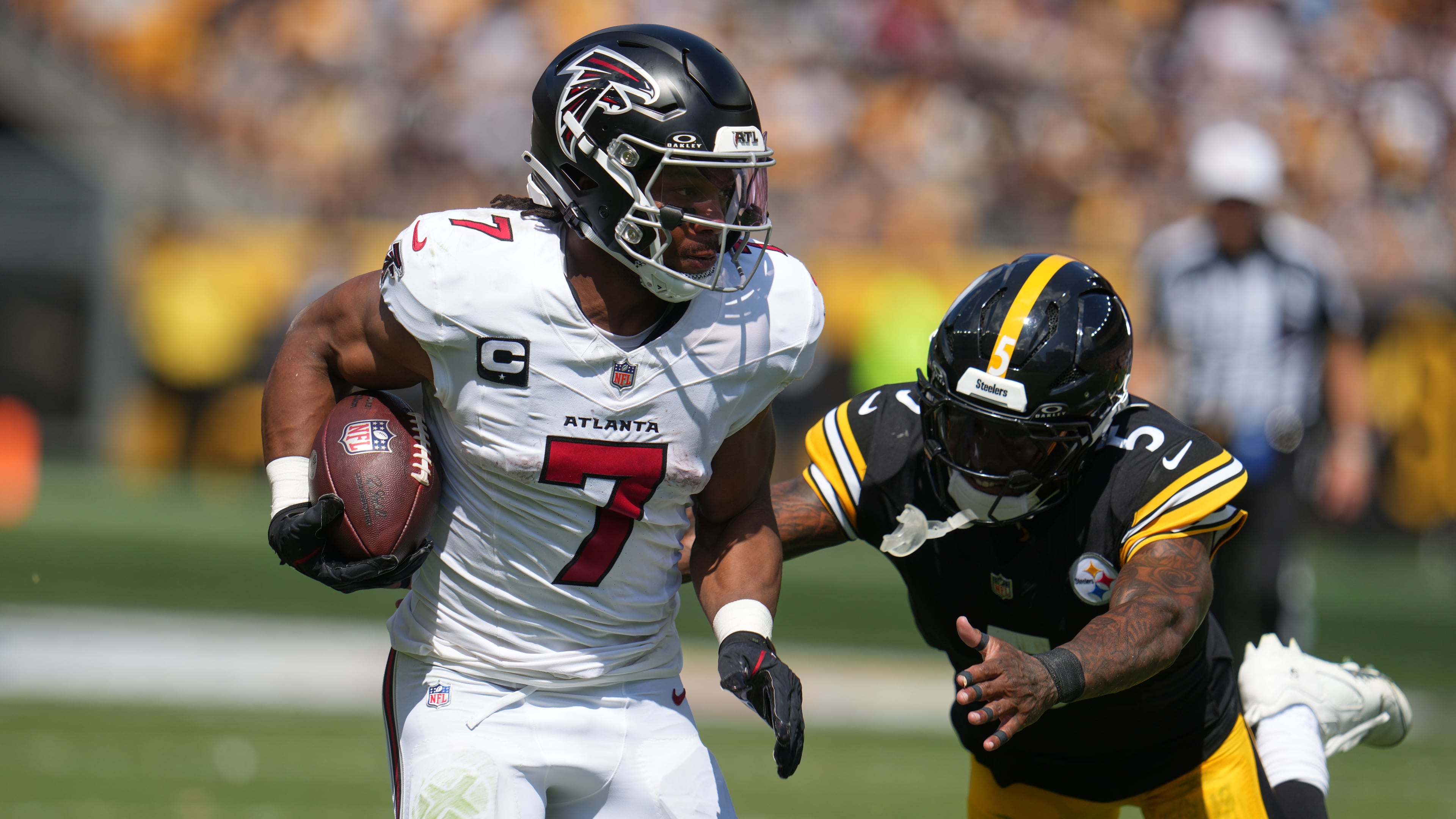 Falcons running back Bijan Robinson runs for a touchdown against the Steelers on Sunday, Sept. 13, 2026 in Pittsburgh. The Falcons took a 20-13 loss. (Gene J. Puskar/AP)