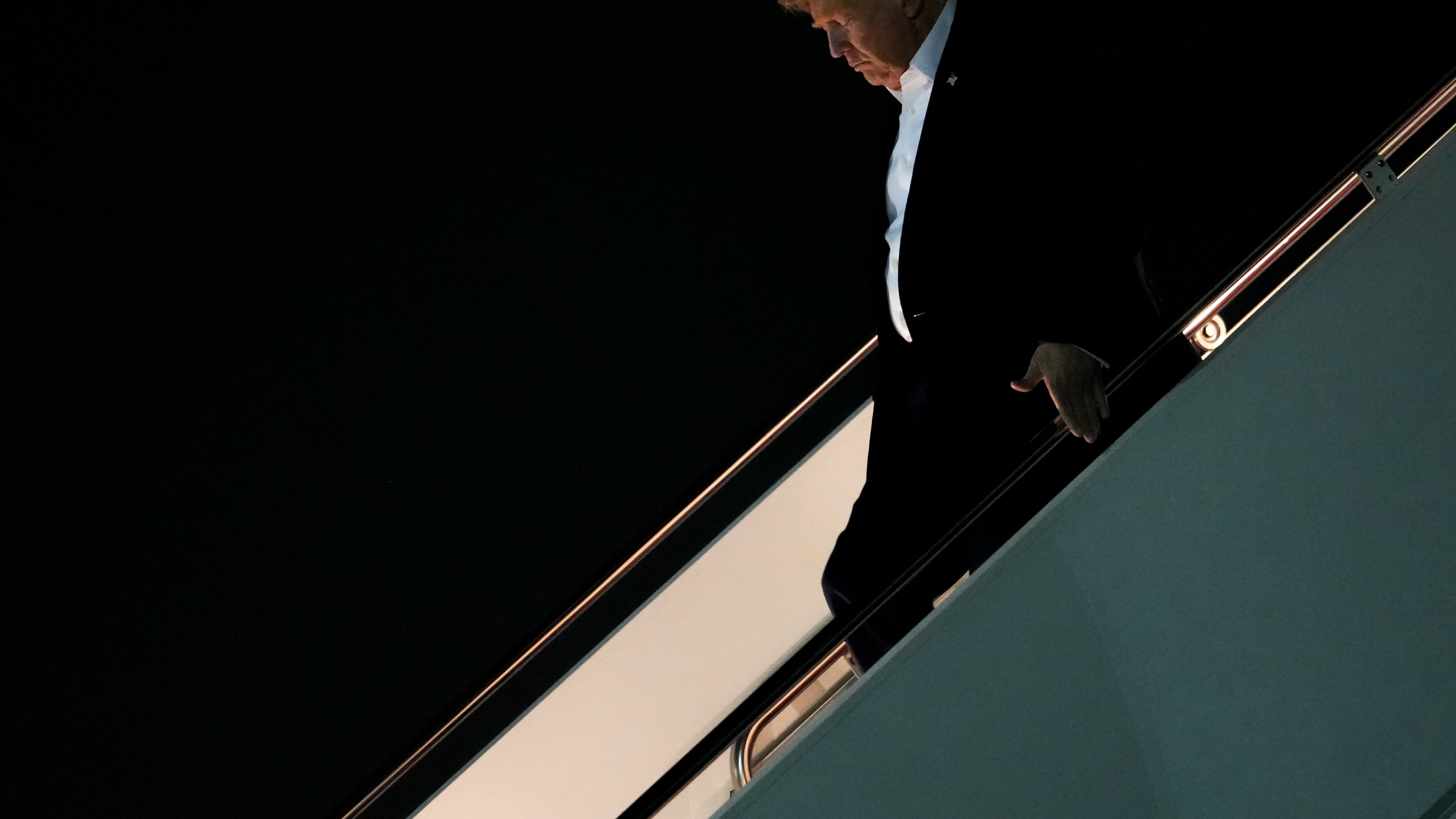President Donald Trump disembarks Air Force One after attending the G7 summit in France, Thursday, June 18, 2026, at Joint Base Andrews, Md. (AP Photo/Julia Demaree Nikhinson)