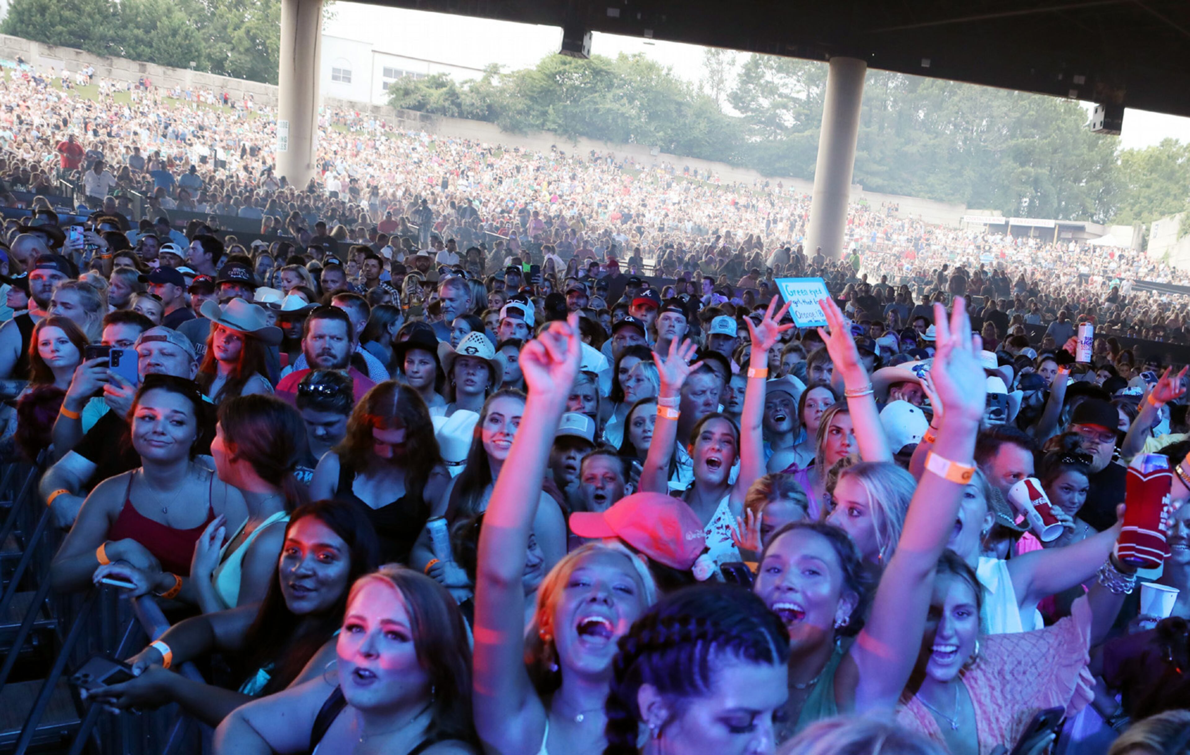 A packed crowd at Lakewood Amphitheatre enjoys Leesburg native Luke Bryan's Raised Right Tour on Saturday, July 9, 2022, in Atlanta with Riley Green and Mitchell Tenpenny opening the show. (Photo: Robb Cohen for The Atlanta Journal-Constitution)