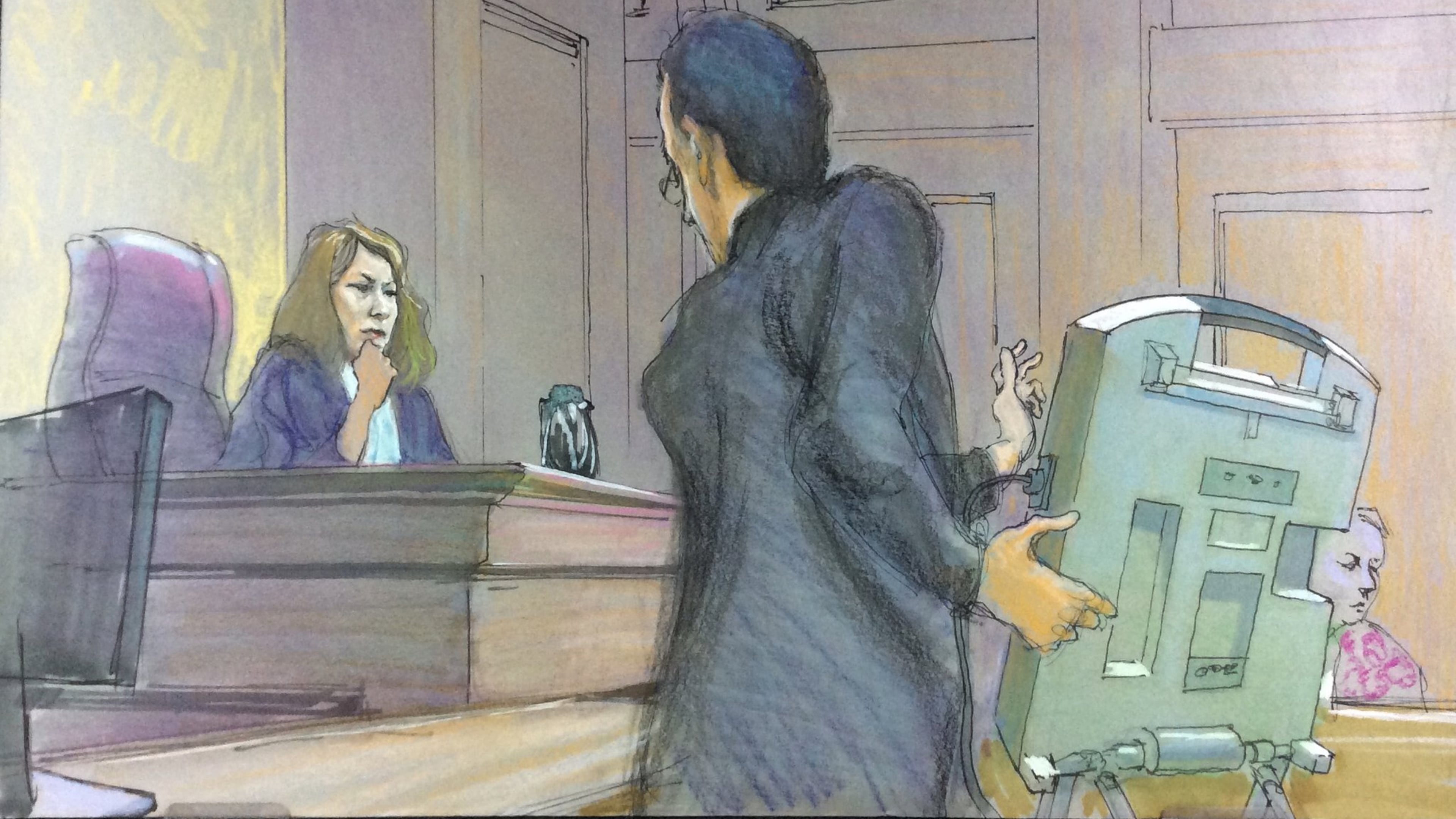 U.S. District Judge Amy Totenberg listens in federal court Wednesday as Alex Halderman, a University of Michigan computer science professor, demonstrates how an electronic voting machine like those used in Georgia could be hacked. Totenberg is overseeing a lawsuit that asked her to invalidate Georgia’s 27,000 touchscreen voting machines and replace them with paper ballots in time for the general election Nov. 6, 2018. She denied the plaintiffs motion for a preliminary injunction Monday. RICHARD MILLER / CONTRIBUTED