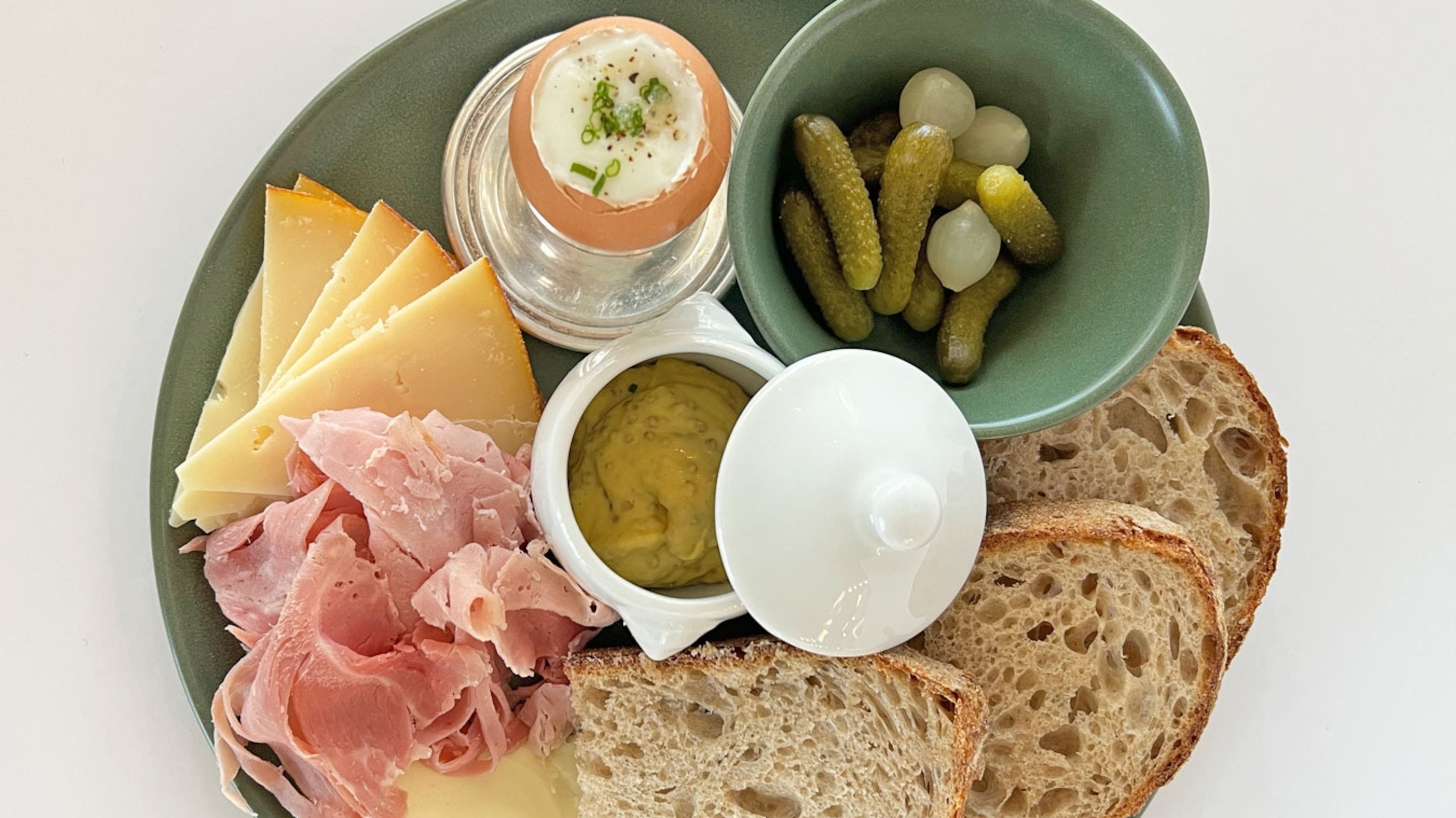 The Ploughman's Lunch with ham, cheddar, cornichons, a soft-boiled farm egg and sourdough is on the menu at Summerland Cafe, Anne Quatrano's latest breakfast and lunch restaurant. (Courtesy of Summerland)