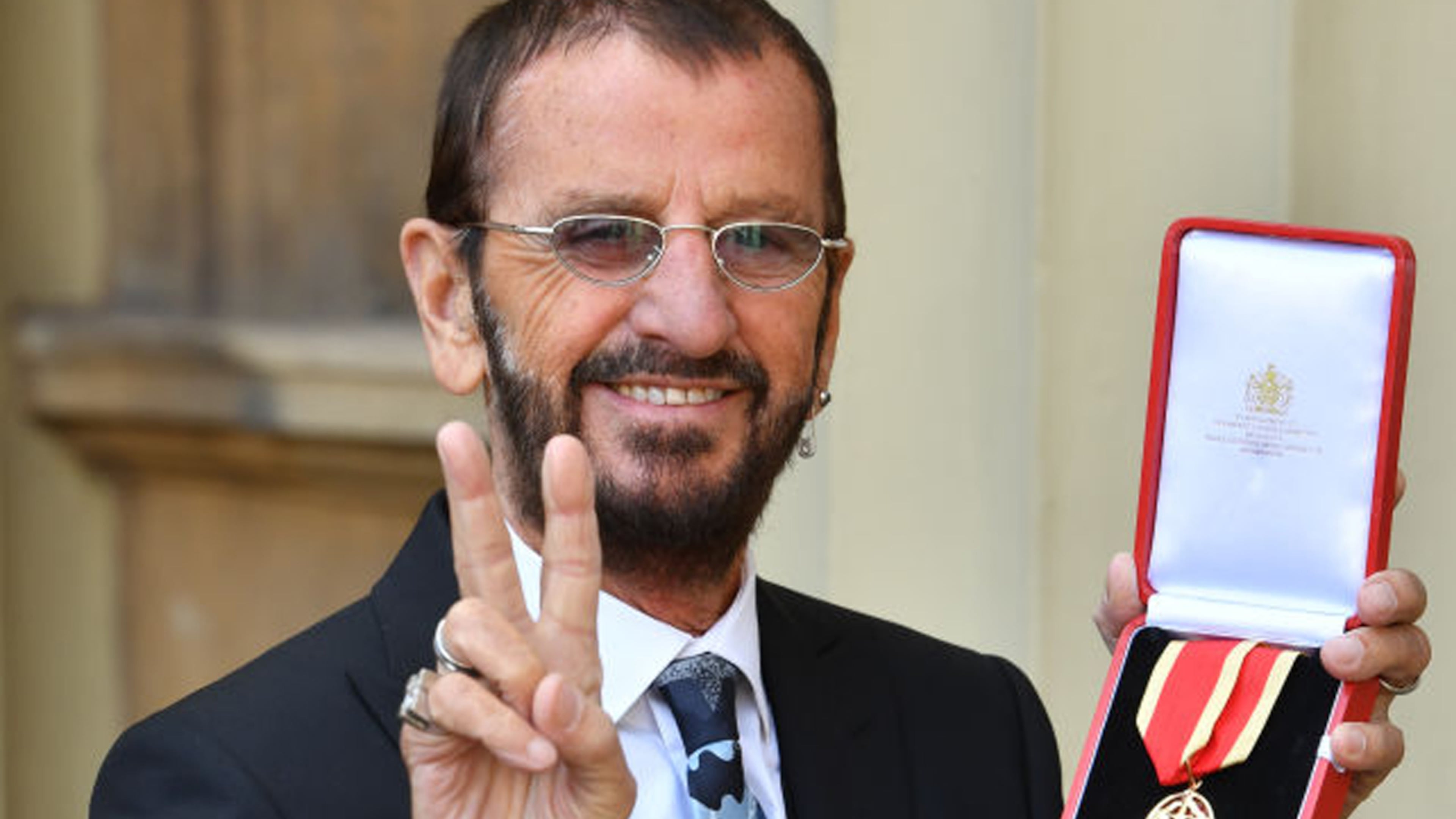 Ringo Starr, real name Richard Starkey, poses at Buckingham Palace after receiving his Knighthood at an Investiture ceremony on March 20, 2018 in London, England.