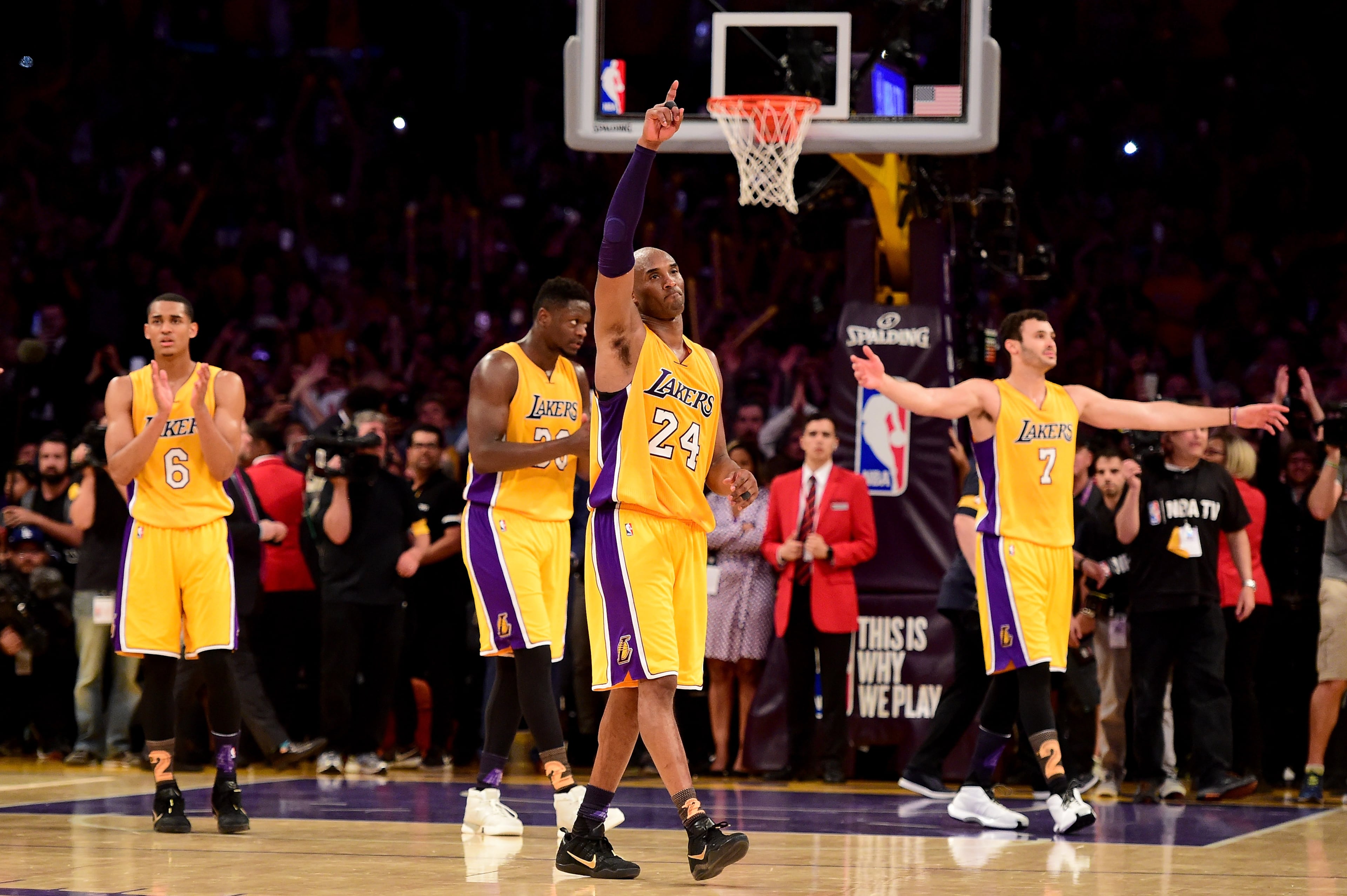 Kobe Bryant #24 of the Los Angeles Lakers waves to the crowd as he is taken out of the game after scoring 60 points against the Utah Jazz at Staples Center on April 13, 2016 in Los Angeles, California. (Photo by Harry How/Getty Images)