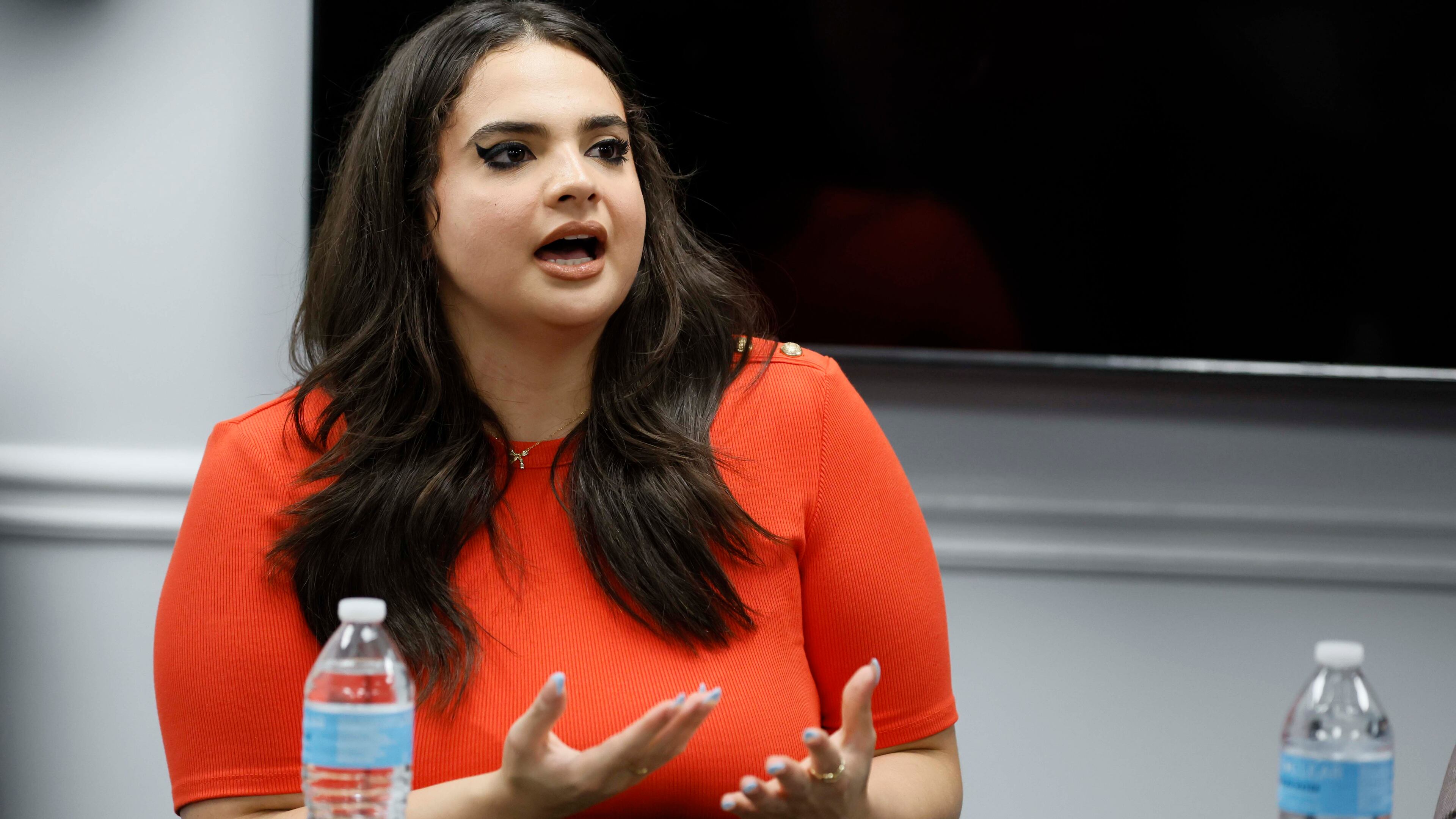 Katherine Guevara speaks during a news conference at the office of her father’s attorneys, Giovanni Diaz and Zacarias Gaeta, discussing Mario Guevara's status following his arrest while covering an immigration rally on Tuesday, June 17, 2025. (Miguel Martinez/AJC)