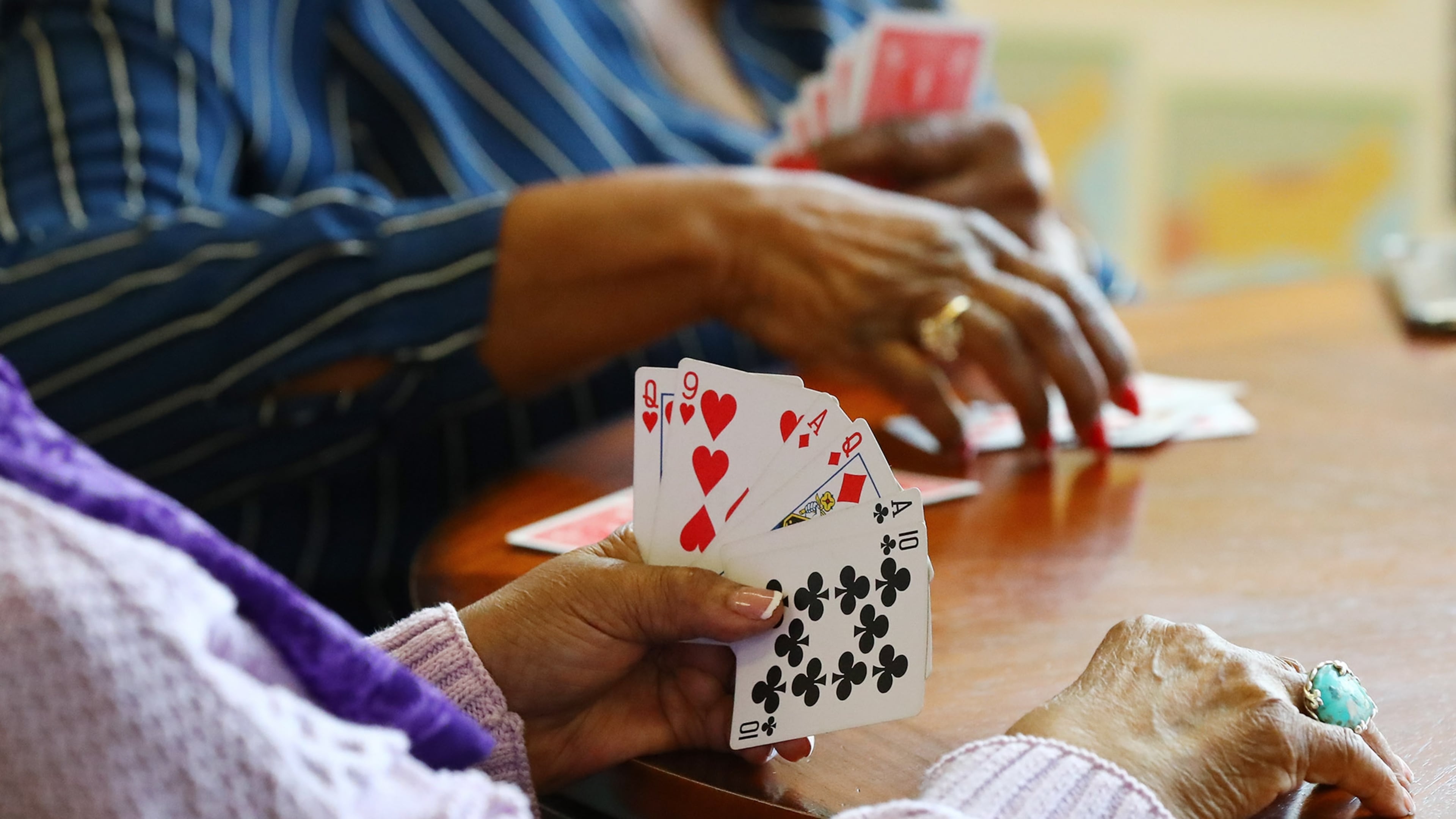 Seniors play cards at the Centerville Senior Center in Snellville. Bridge still demands focus, strategy and steady growth — making it as mentally rewarding today as it has always been. (AJC 2022)