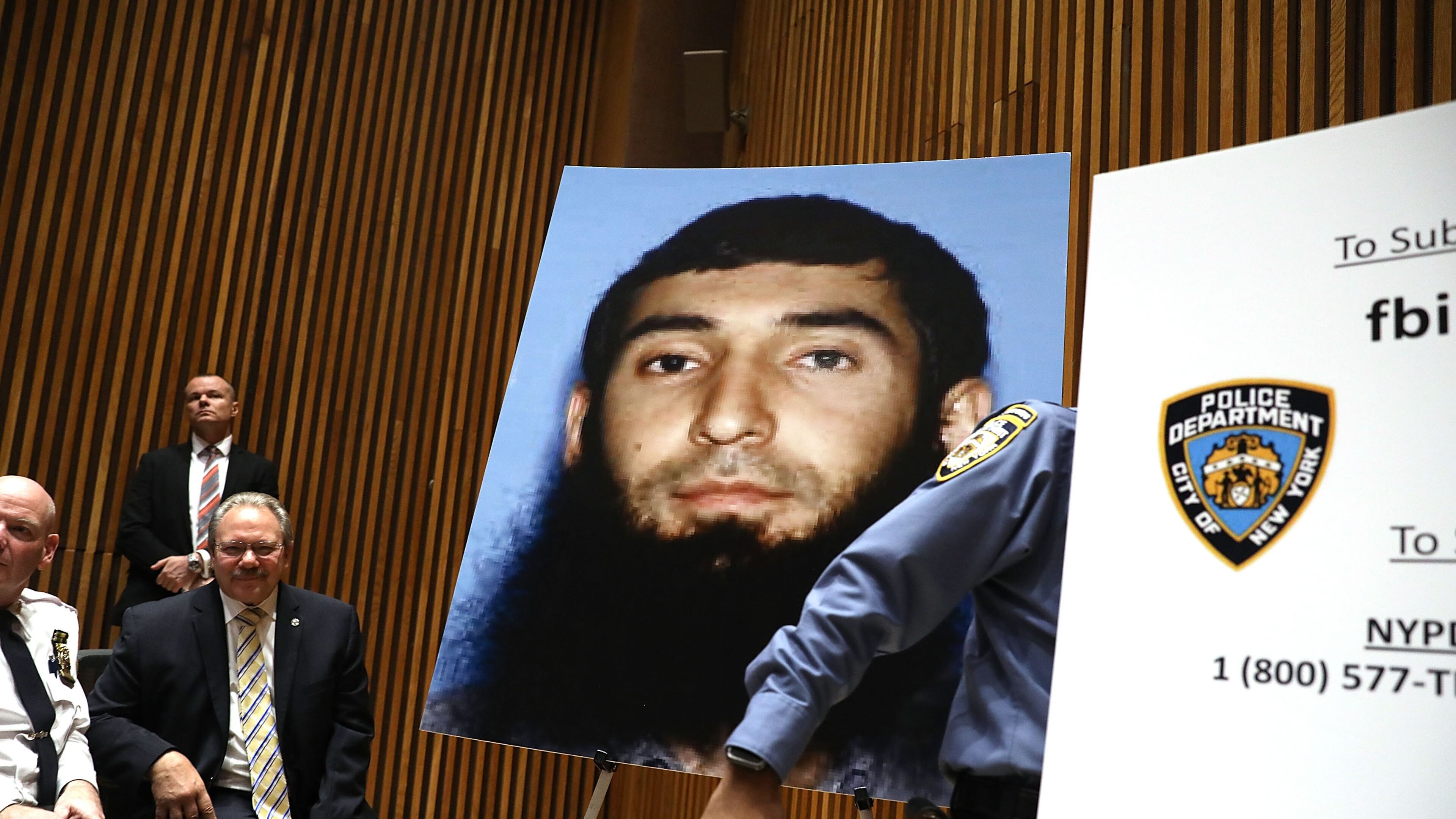 A picture of suspect Sayfullo Saipov is displayed during a press conference about Tuesday's terror attack along a bike path in lower Manhattan. Spencer Platt/Getty Images