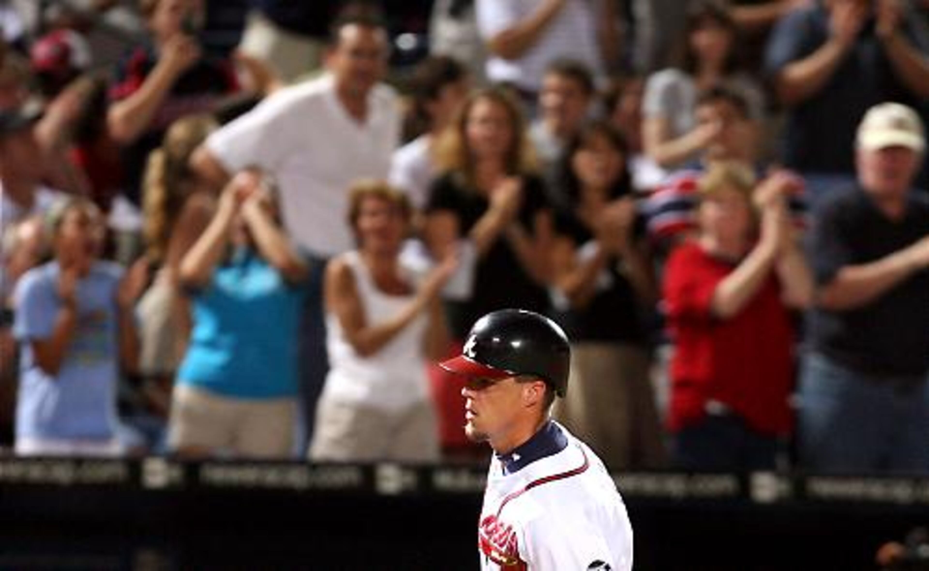 Chipper Jones rounds the bases following his home run in the third that gave the Braves a 3-0 lead.