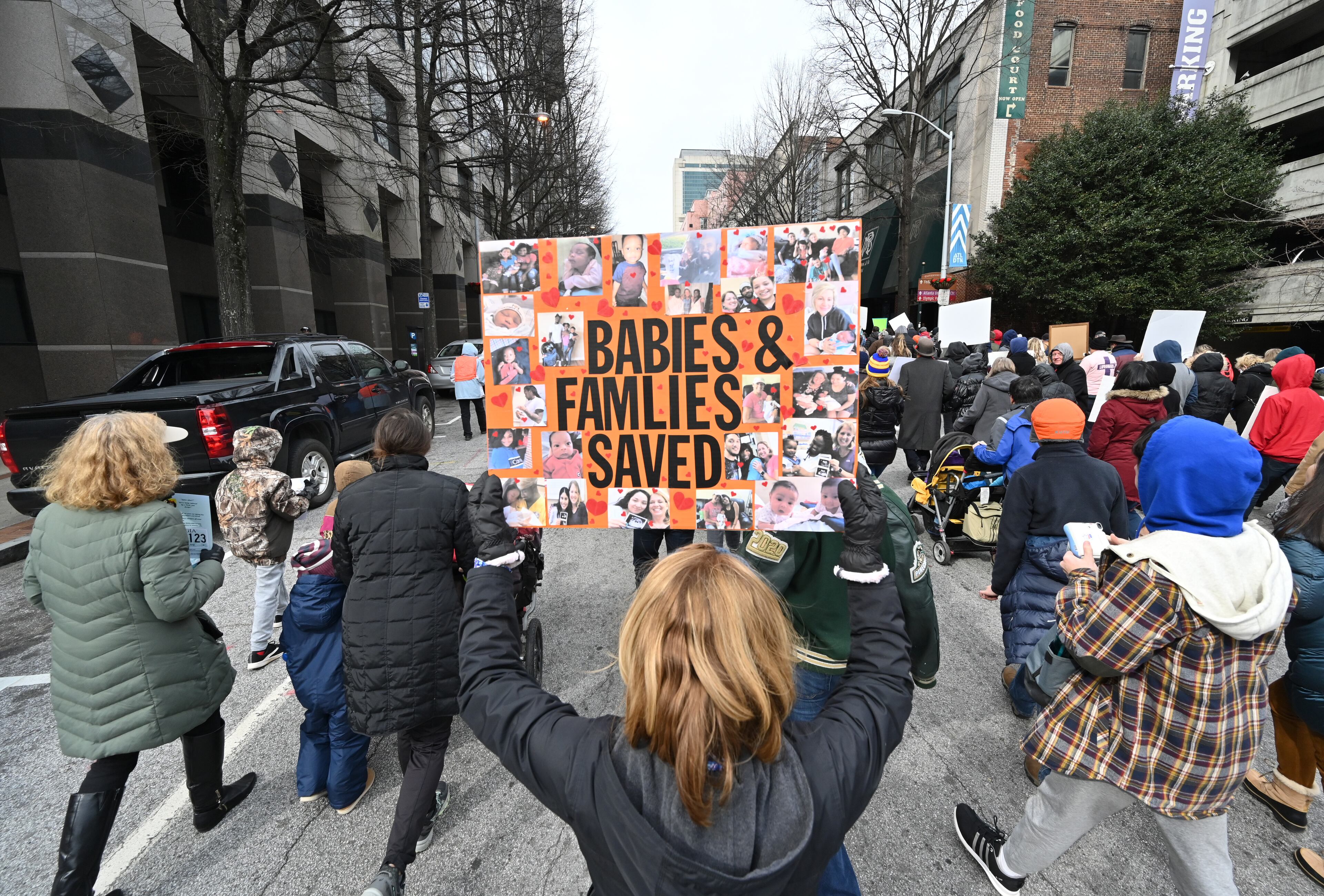 January 22, 2020 Atlanta - Hundreds of pro-life supporters walk down Martin Luther King Jr. Dr. during the 2020 Georgia March For Life & Memorial Service to raise awareness and support of anti-abortion legislation at Liberty Plaza on Wednesday, January 22, 2020. Anti-abortion advocates scored a win last year when Georgia passed a law that would ban the procedure once a doctor can detect fetal cardiac activity. But Georgia Right to Life had urged lawmakers to vote against it - and unendorsed several Republican candidates who voted in support of it - saying the bill did not go far enough because it allowed exceptions in instances of rape and incest. (Hyosub Shin / Hyosub.Shin@ajc.com)