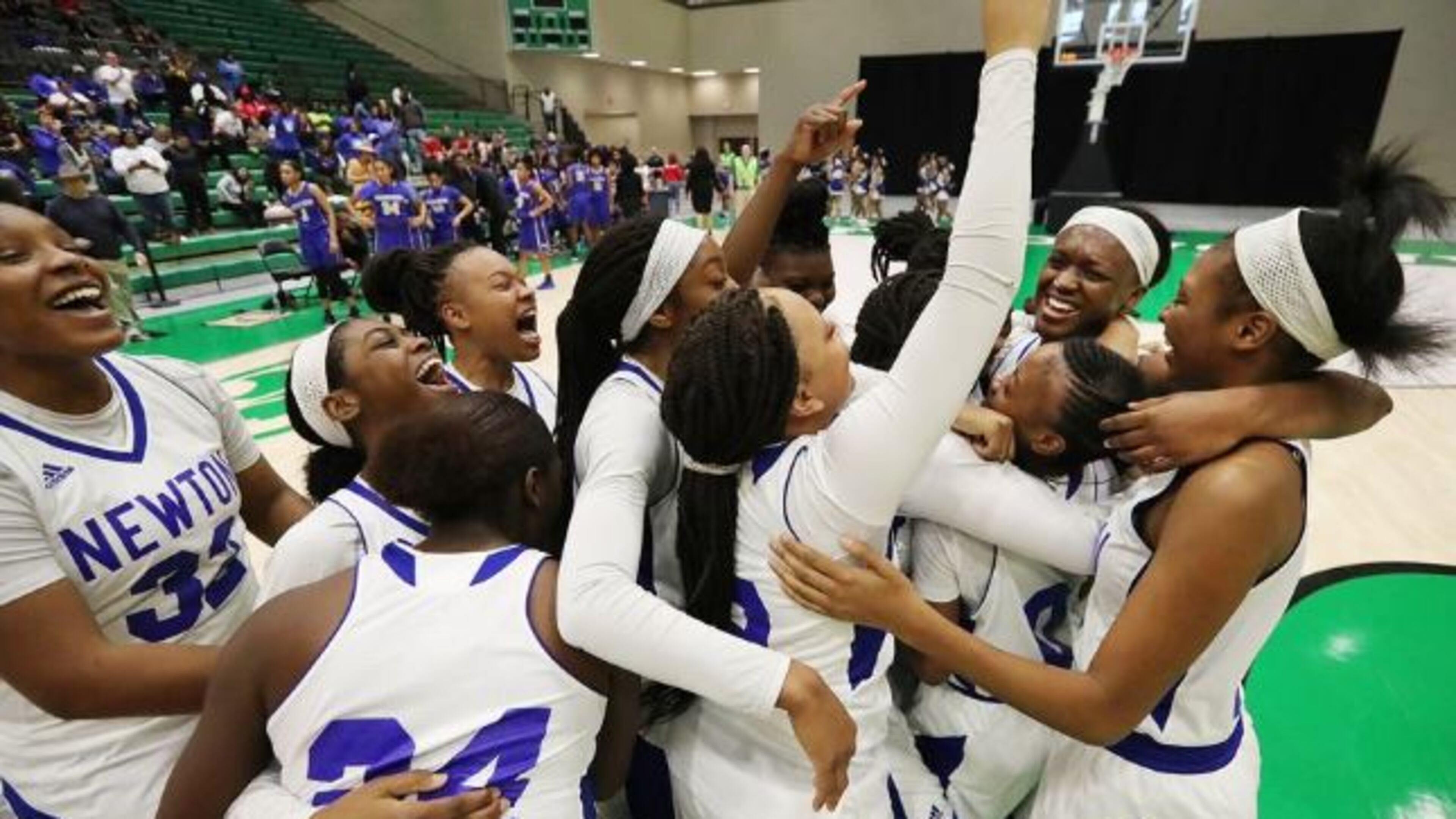 Newton girls celebrate their semifinal win