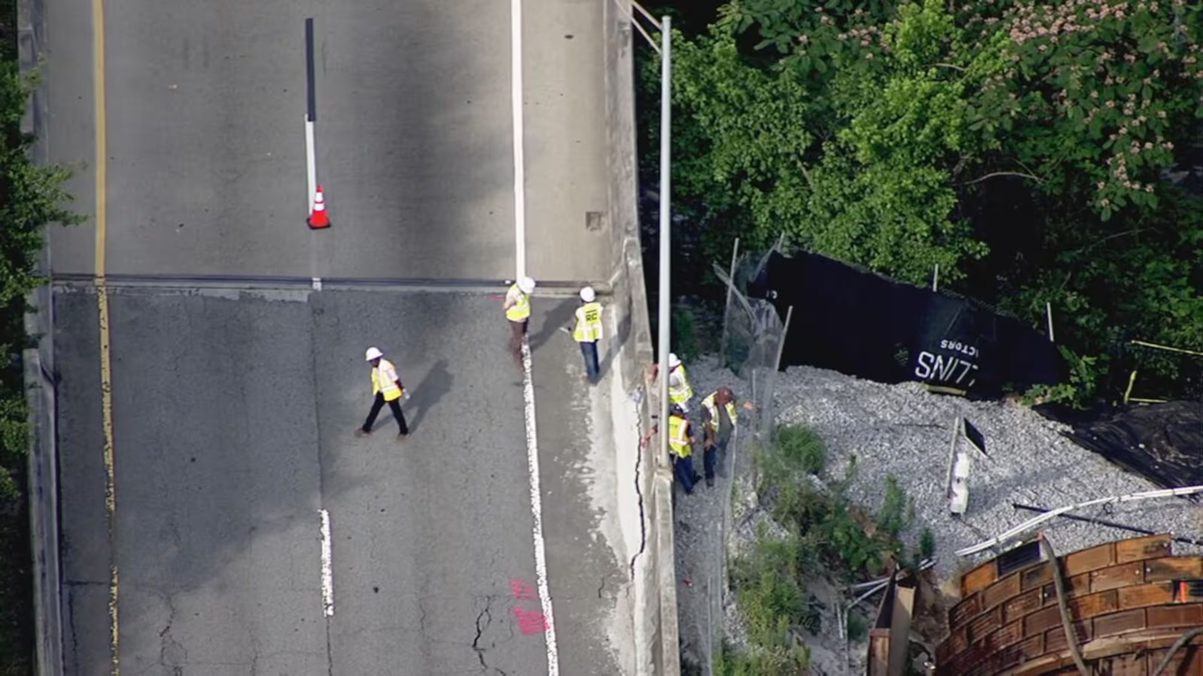 Cracks on the Buford Spring Connector northbound ramp to I-85 were visible from the Channel 2 Action News helicopter Friday. (Courtesy of WSB-TV)