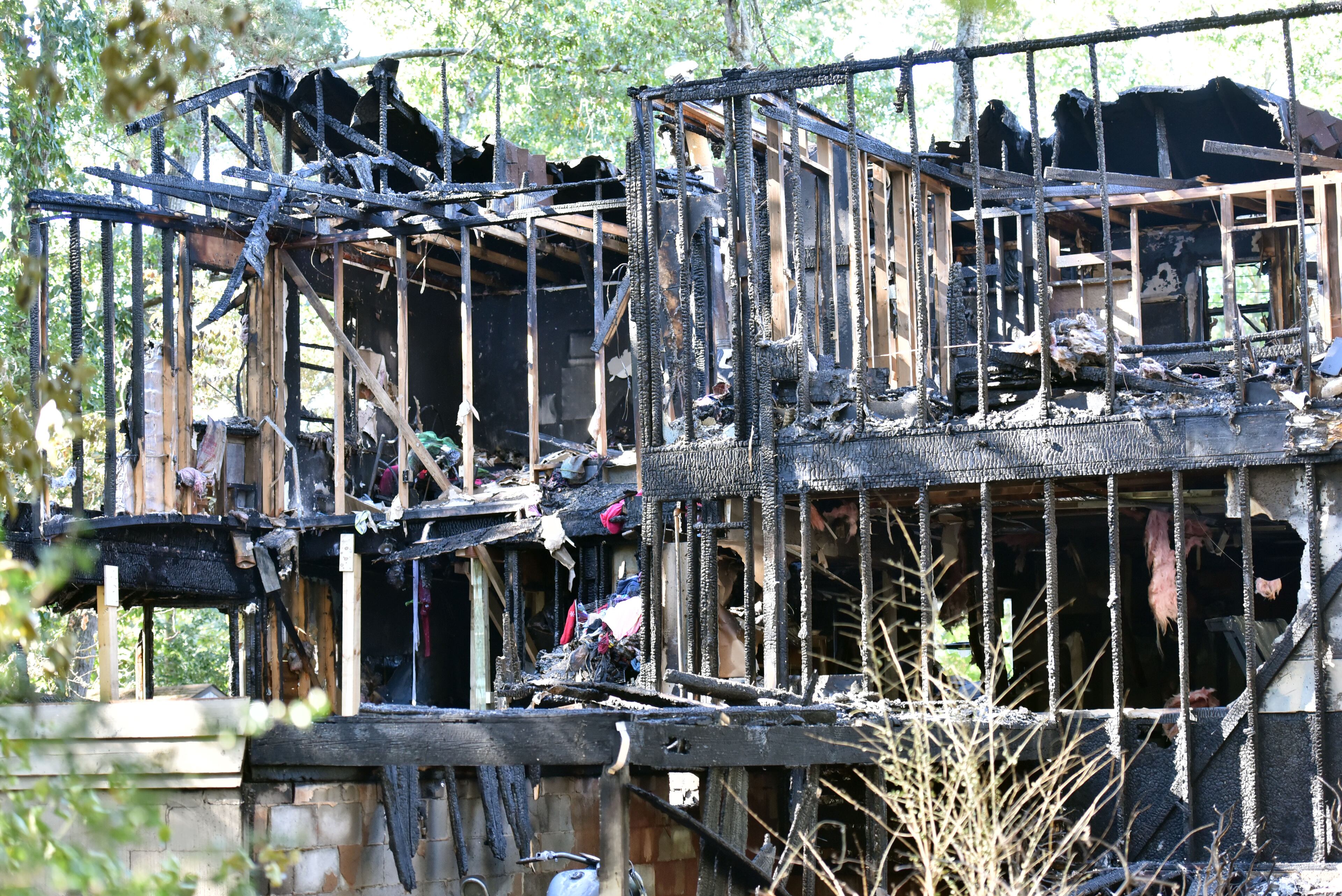 October 23, 2016 Duluth - Five adults were found dead after a fire gutted a home in the 2200 block of Post Oak Drive in unincorporated Duluth early Sunday morning on Sunday, October 23, 2016. Five people are dead after a fire gutted a home in unincorporated Duluth early Sunday morning, Gwinnett County fire officials said. Gwinnett County Department of Fire and Emergency Services Capt. Tommy Rutledge confirmed that five adults were found dead in the home in the 2200 block of Post Oak Drive NW, a two-story structure in the middle of a dead-end street near Old Peachtree Road. HYOSUB SHIN / HSHIN@AJC.COM