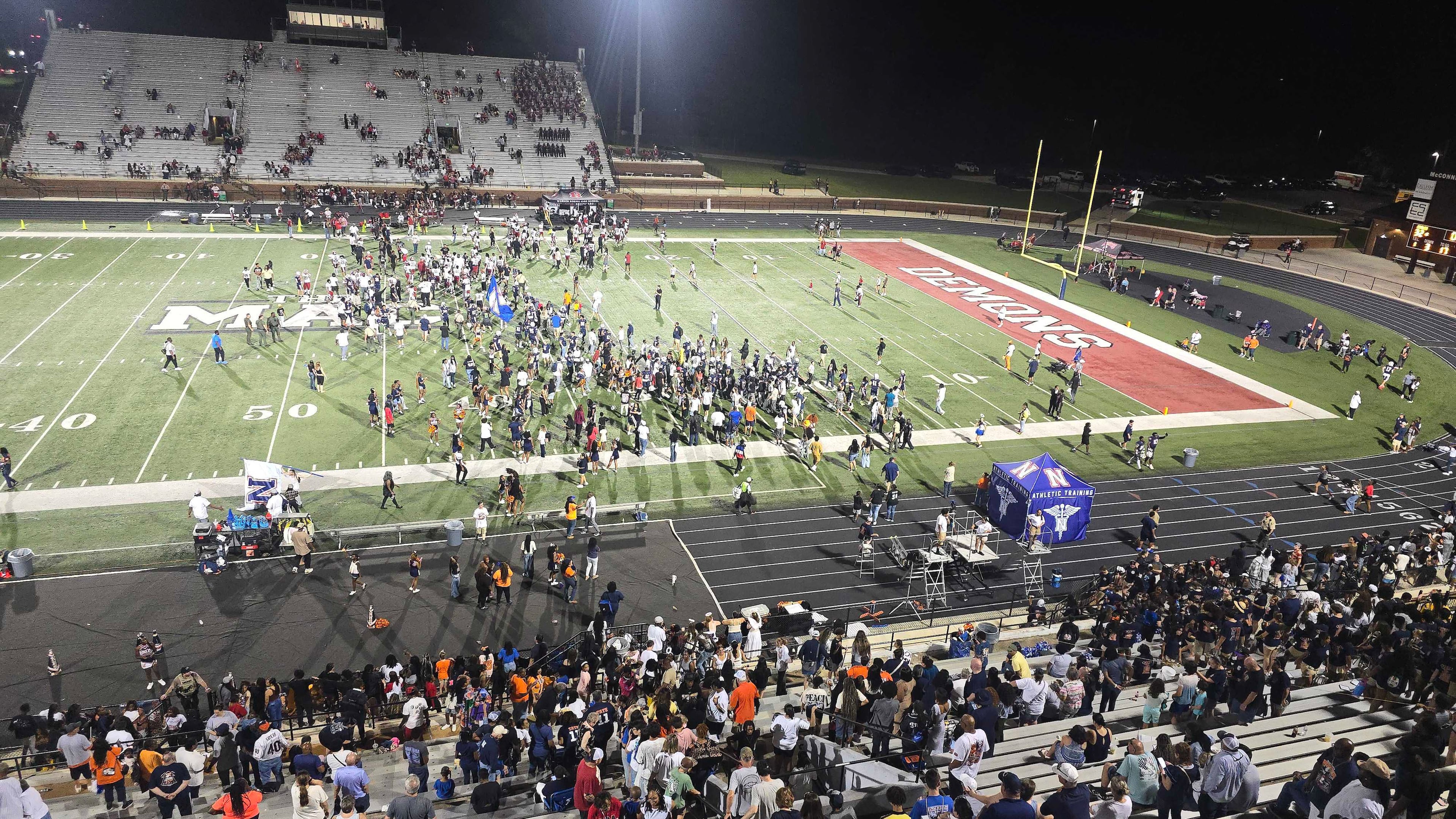 Students empty the stands after Northside of Warner Robins defeats Warner Robins on Sept. 4 to end a nine-game losing streak in the rivalry. (Cody Chaffins/AJC)