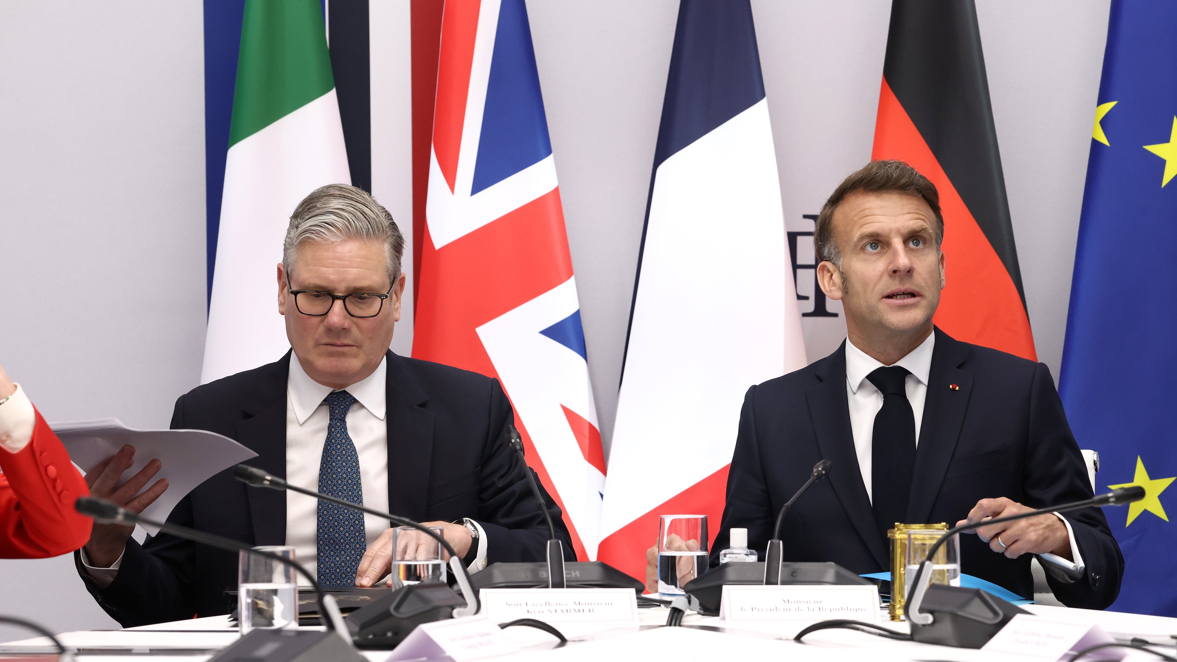 British Prime Minister Keir Starmer, left, and French President Emmanuel Macron co-host a multinational virtual summit at the Elysee Presidential Palace in Paris, Friday April 17, 2026 (Tom Nicholson/Pool Photo via AP)