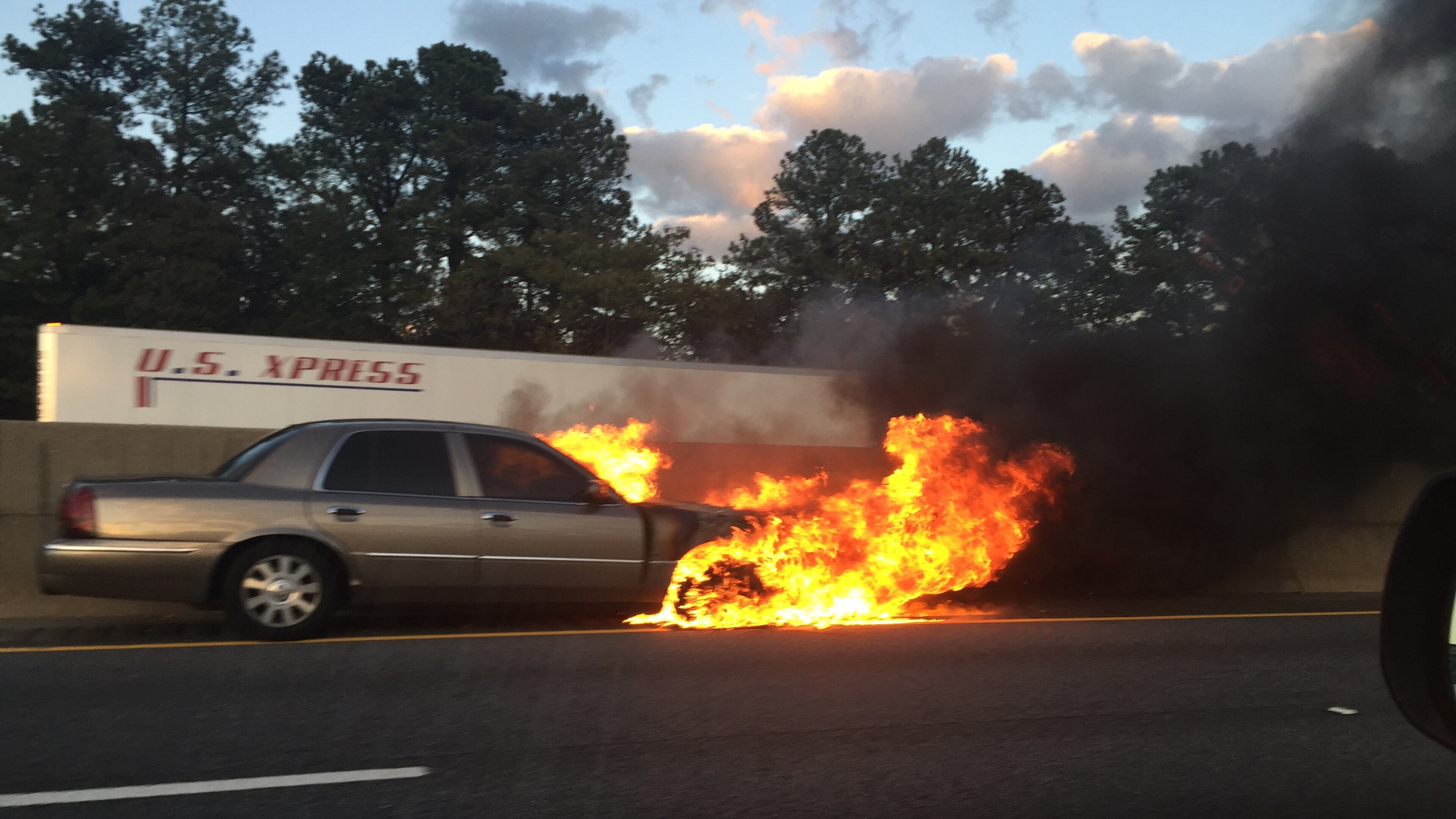 Lanes were blocked on I-285 East on Tuesday when a car caught fire.