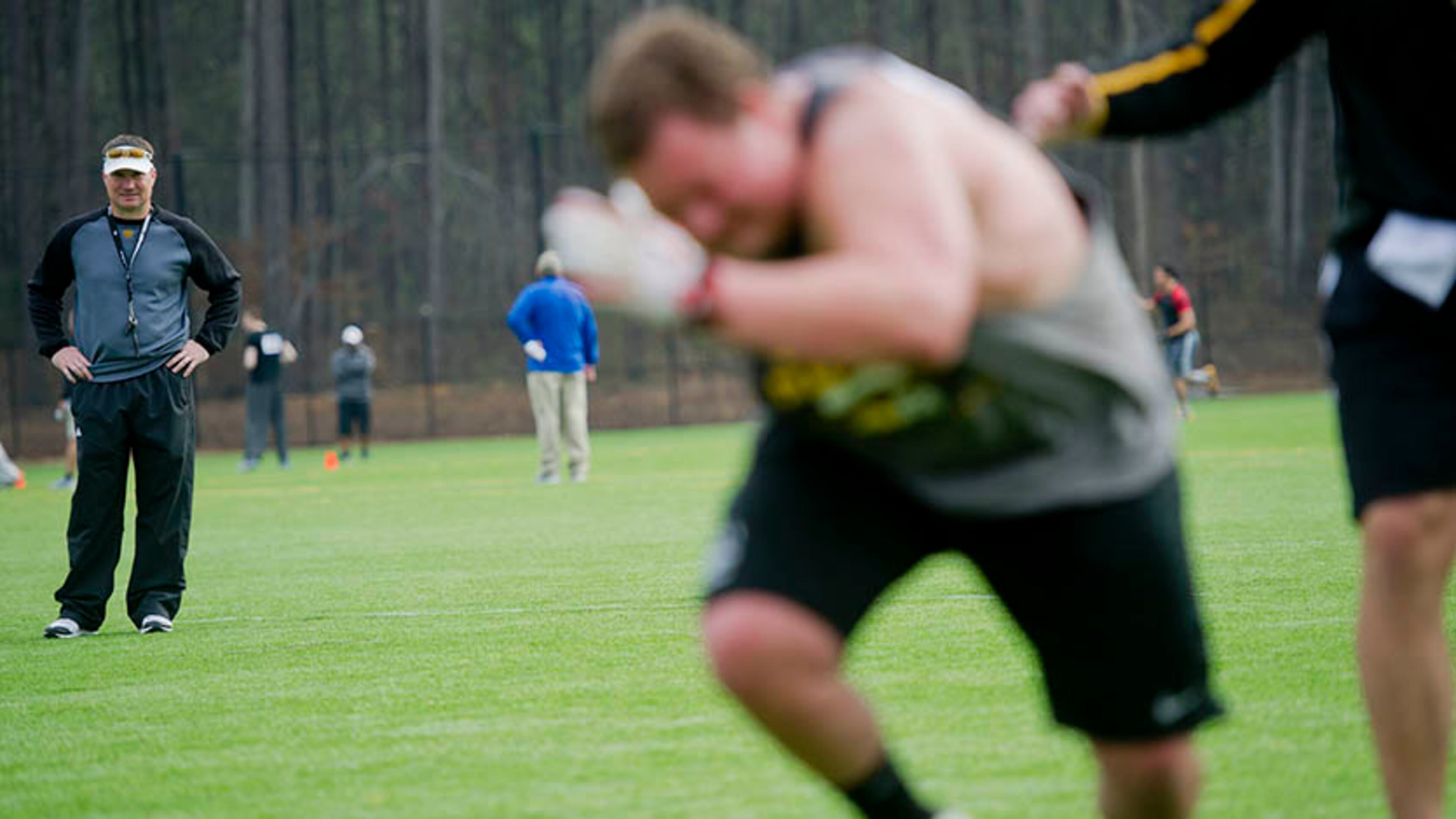 Kennesaw State coach Brian Bohanon (left) has begun training his team for their 2015 debut.