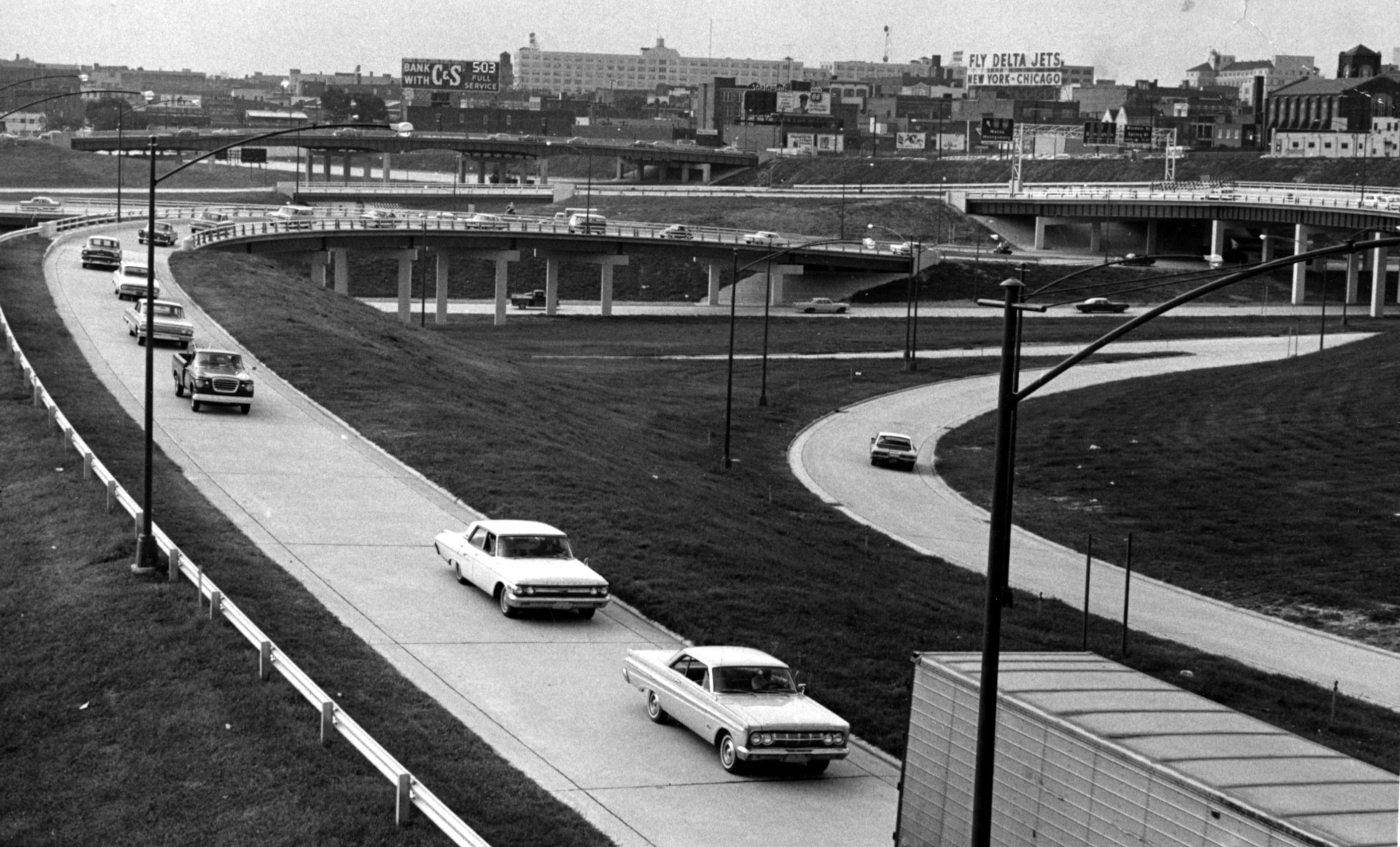 Sept. 18,1964 - Five p.m. traffic moves smoothly over the downtown Expressway Connector which was opened Friday. (Traffic in foreground appears to be heading east to I-20)