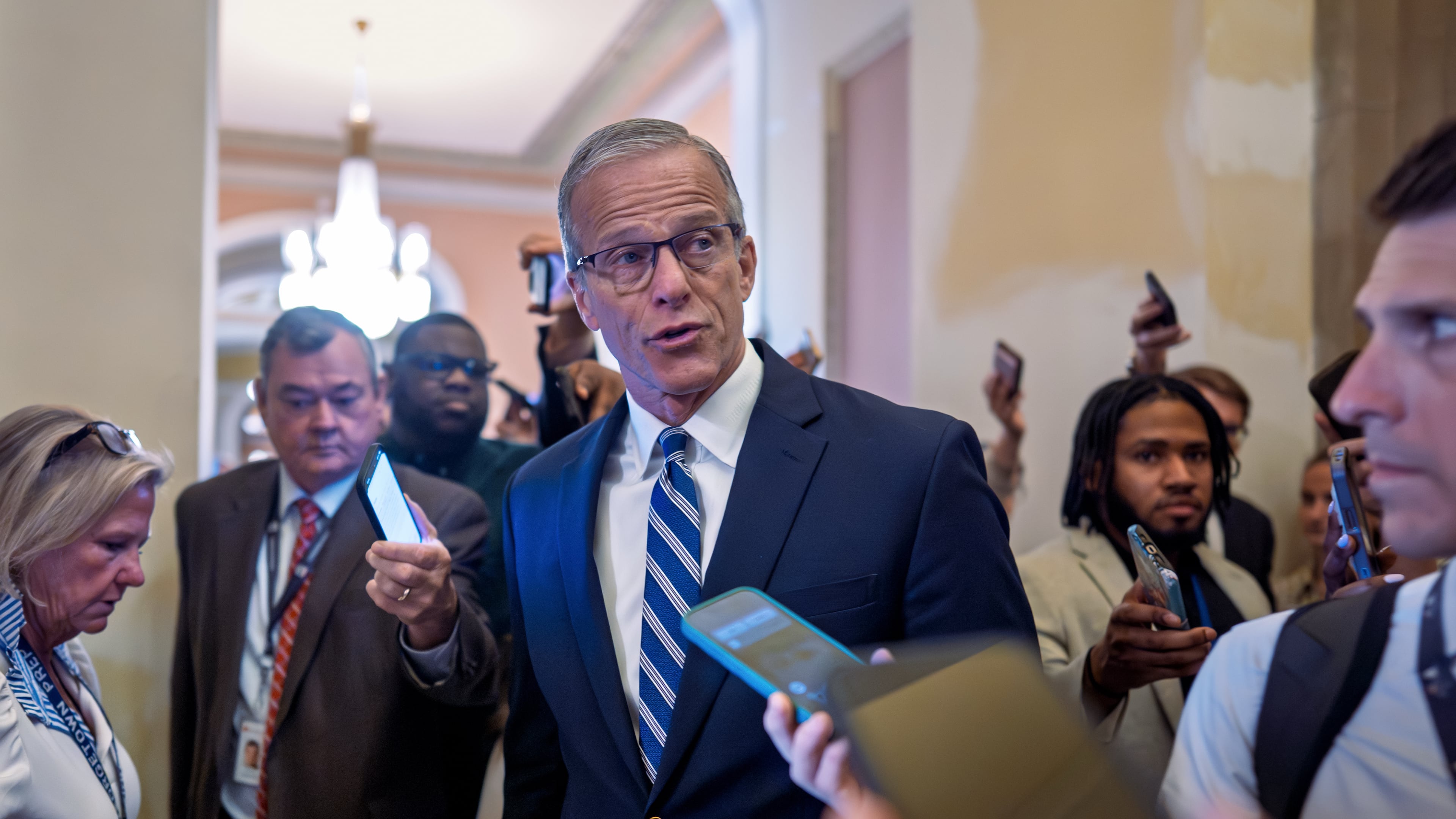 Senate Majority Leader John Thune, R-S.D., pauses for questions from reporters before votes on the immigration enforcement funding package, at the Capitol in Washington, Thursday, June 4, 2026. (AP Photo/J. Scott Applewhite)