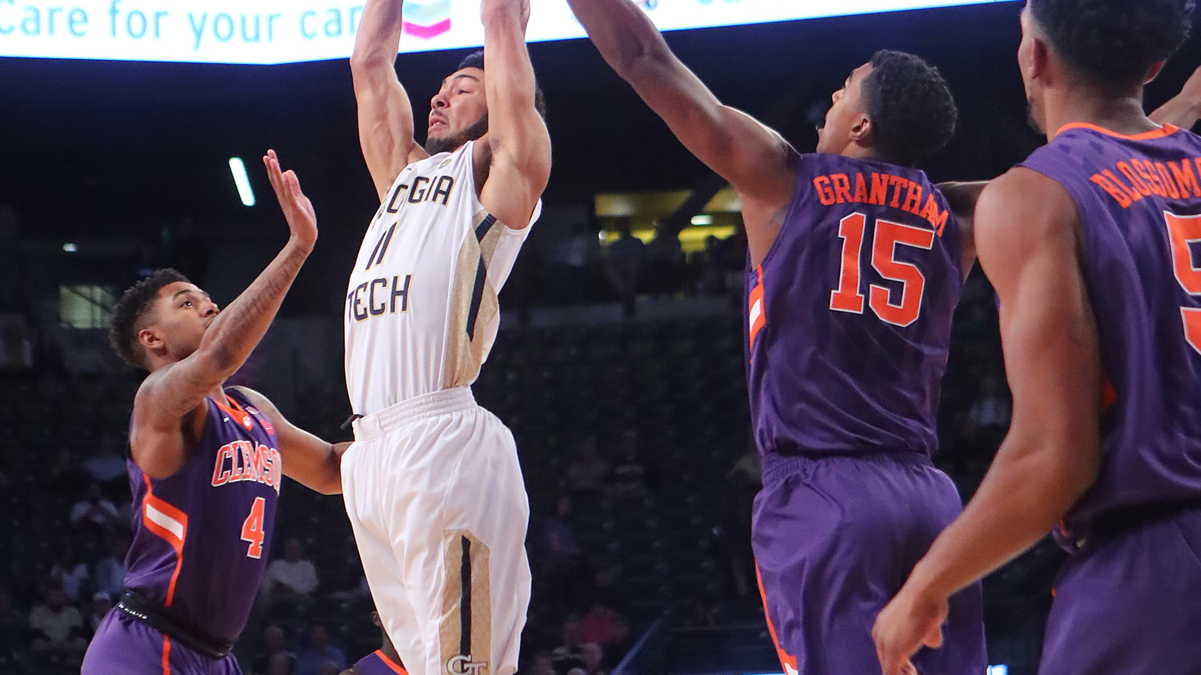 January 12, 2017, Atlanta: Georgia Tech guard Josh Heath goes up for a pass over Clemson defenders Shelton Mitchell (left) and Donte Grantham during an NCAA basketball game on Thursday, Jan. 12, 2017, in Atlanta. Curtis Compton/ccompton@ajc.com