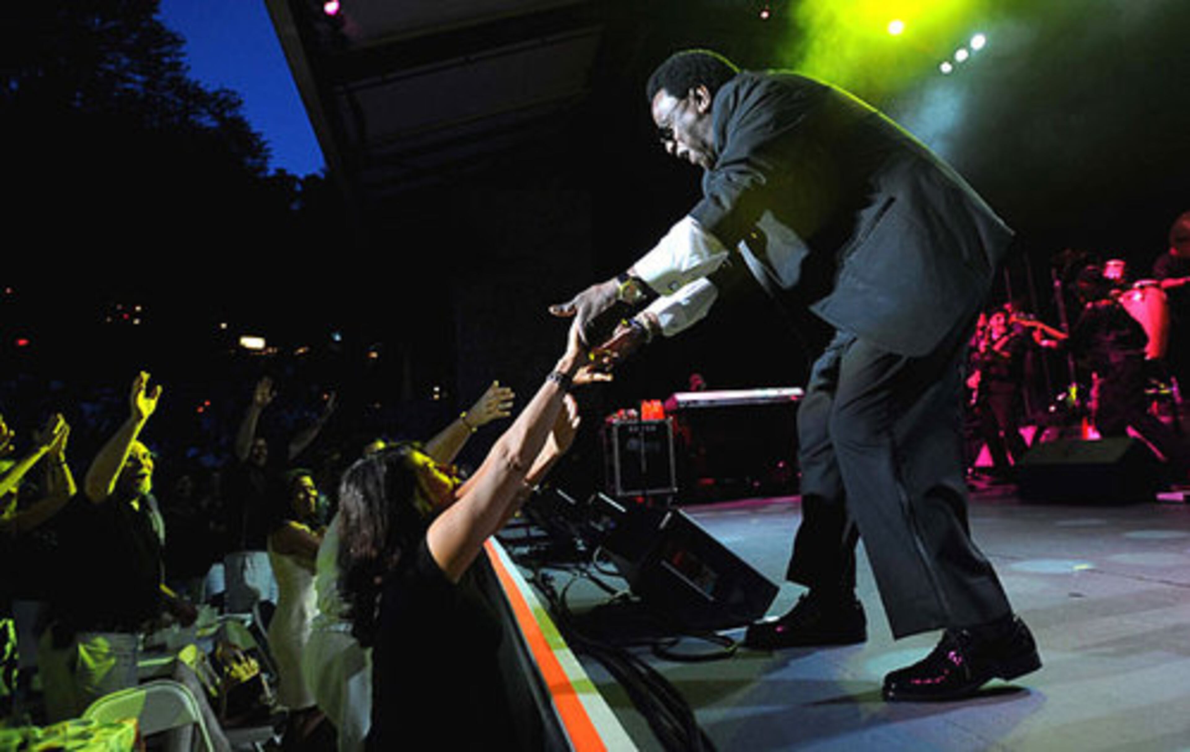Al Green greets fans during the concert Wednesday night.