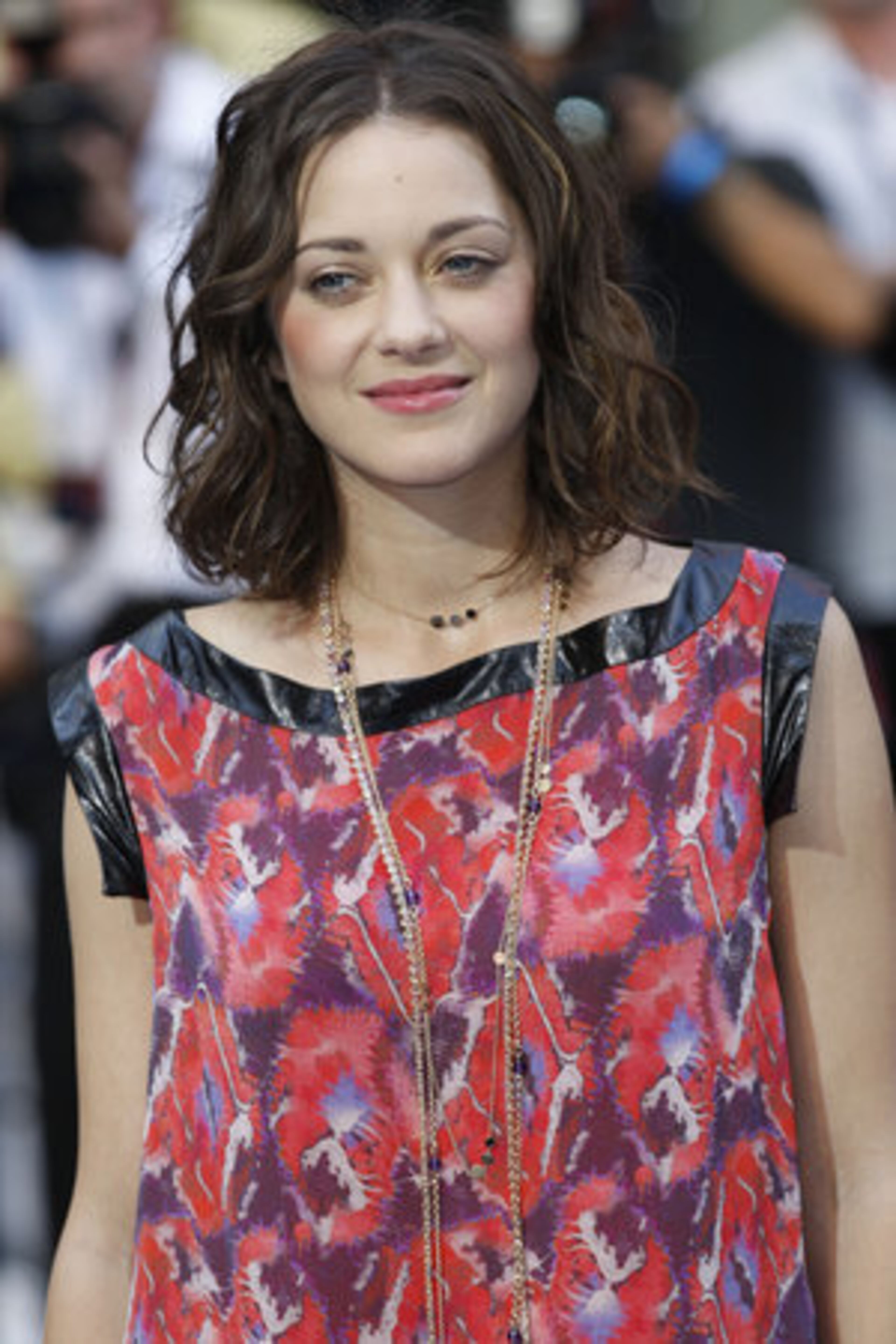 French actress Marion Cotillard was the target of a New York City woman who faces charges that she sent threatening email messages and videos to a Web site dedicated to Cotillard. FBI agents say in a court filing that Teresa Yuan, of Queens, sent a series of spooky messages in July that included ramblings about wanting to play Russian Roulette with the actress.