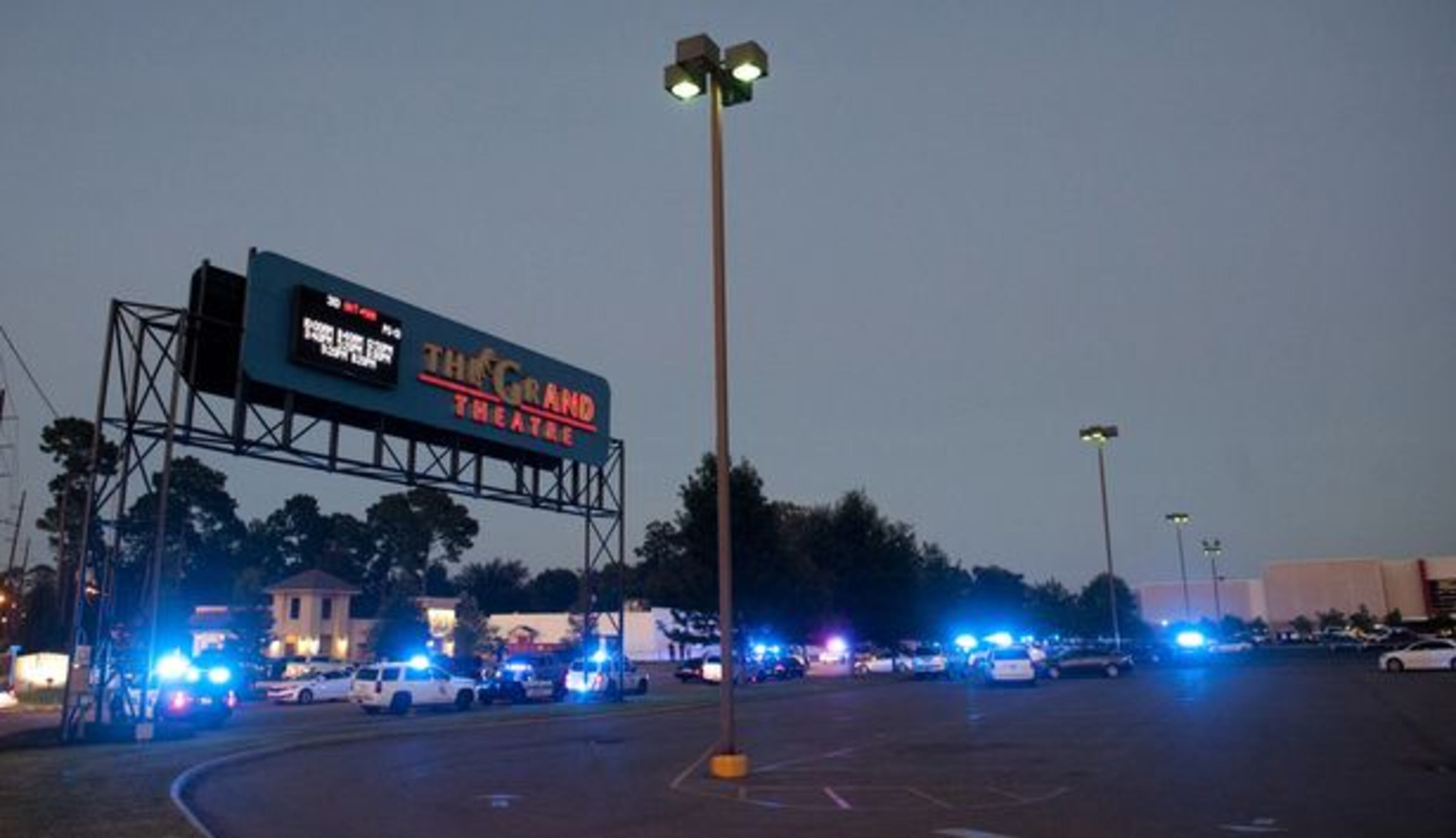 Police surround the scene following a shooting at a movie theater Thursday, July 23, 2015, in Lafayette, La. (AP)