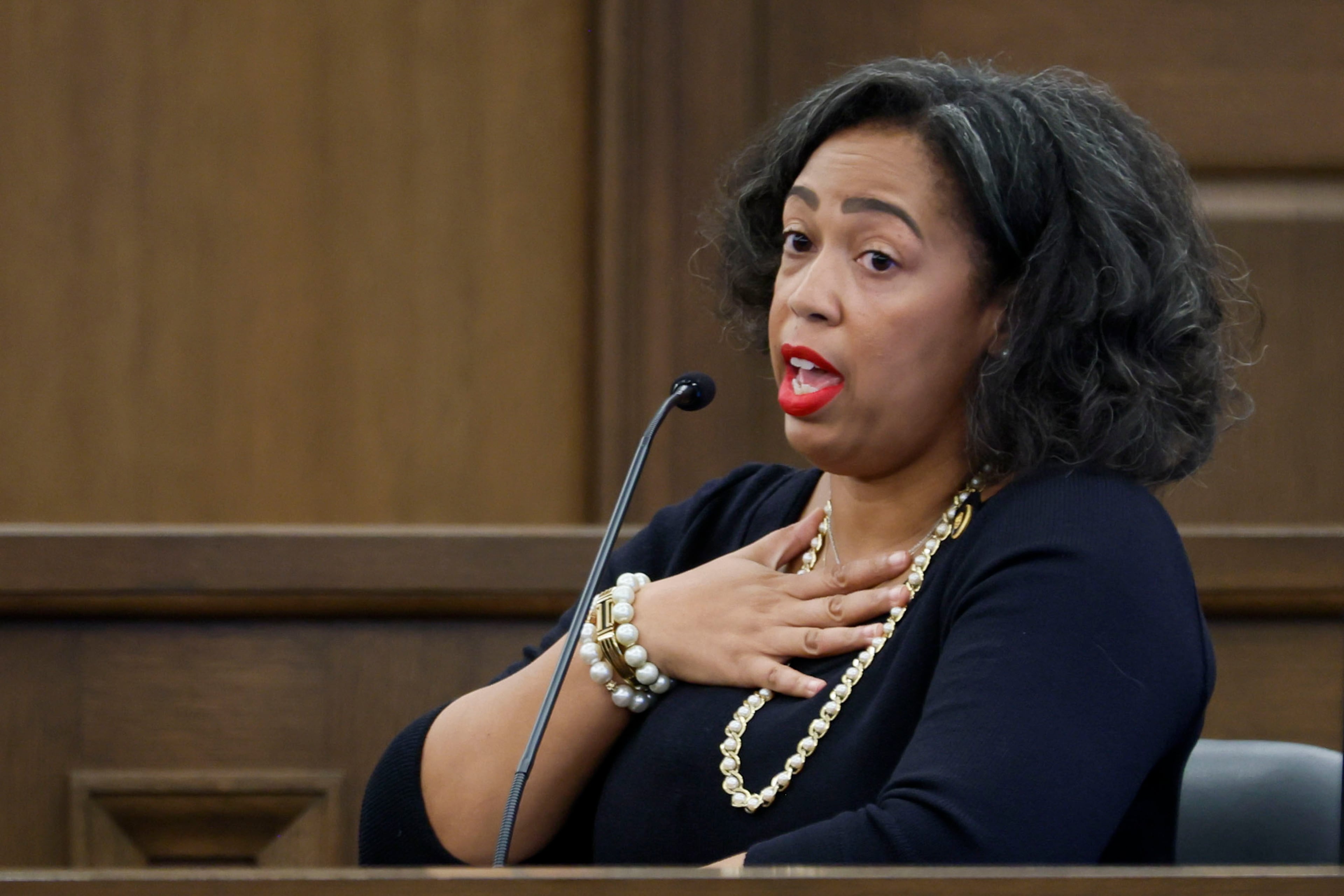 Former Fulton County Superior Court Judge Shermela Williams, pictured testifying at a misconduct hearing in May 2025, can't be sued by a young woman she jailed to address "daddy issues," a federal judge in Atlanta ruled Monday. (Miguel Martinez/AJC)