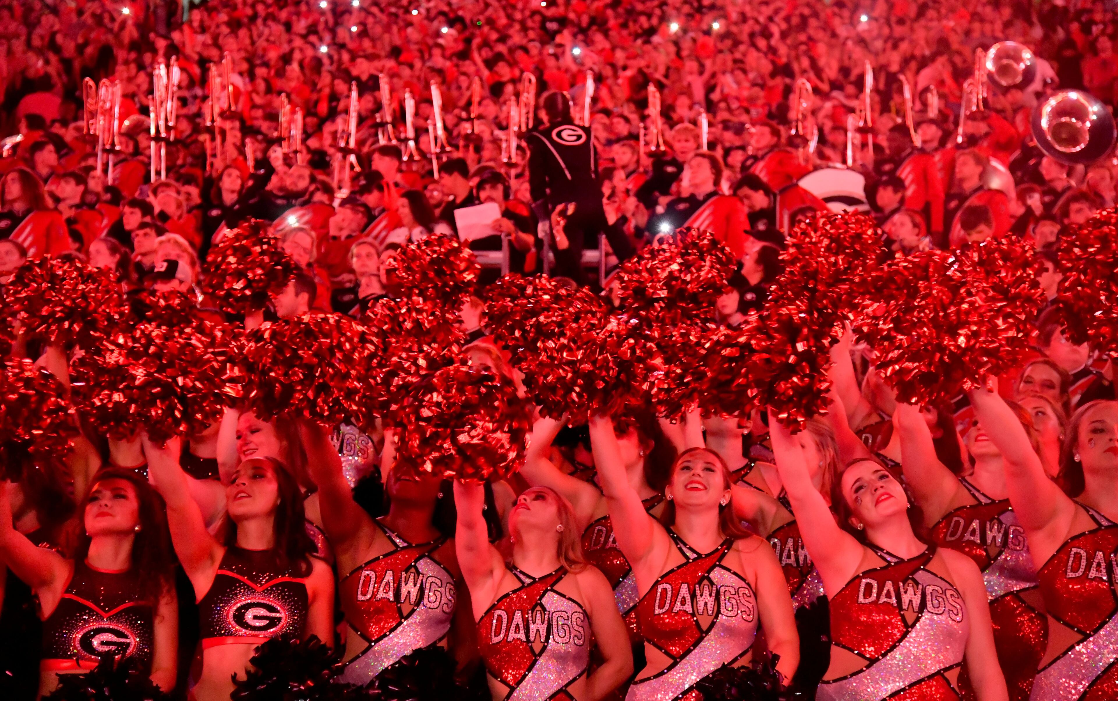 Georgia fans light up the stadium at the start of the fourth quarter in an NCAA football game at Sanford Stadium, Saturday, September 2, 2023, in Athens. Georgia won 48-7 over UT Martin. (Hyosub Shin / Hyosub.Shin@ajc.com)