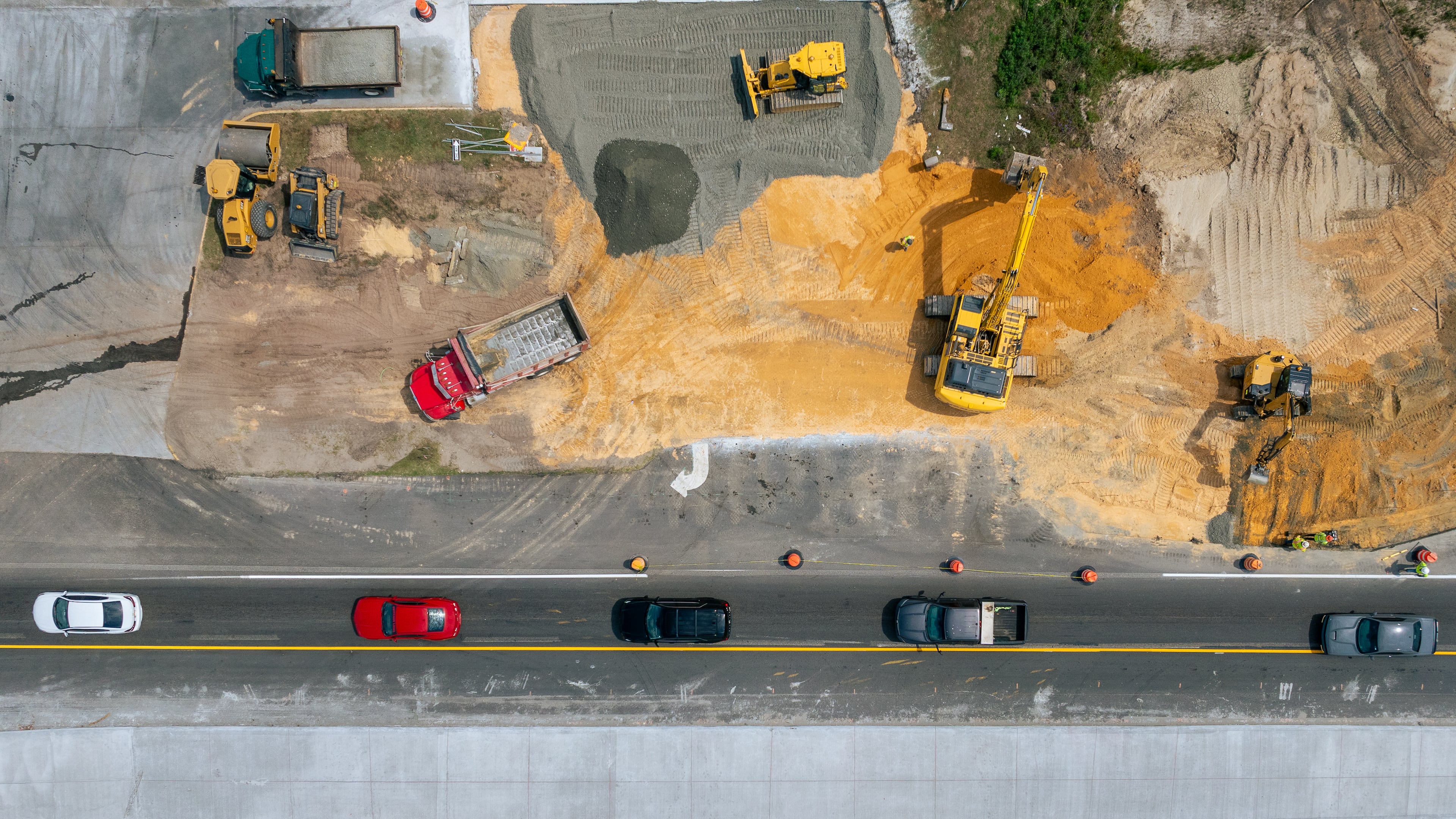 Cars pass through road construction on U.S. Hwy 280 after a shift change at the Hyundai Metaplant in Bryan County, GA on April 23, 2025. (Justin Taylor for The Atlanta Journal-Constitution)