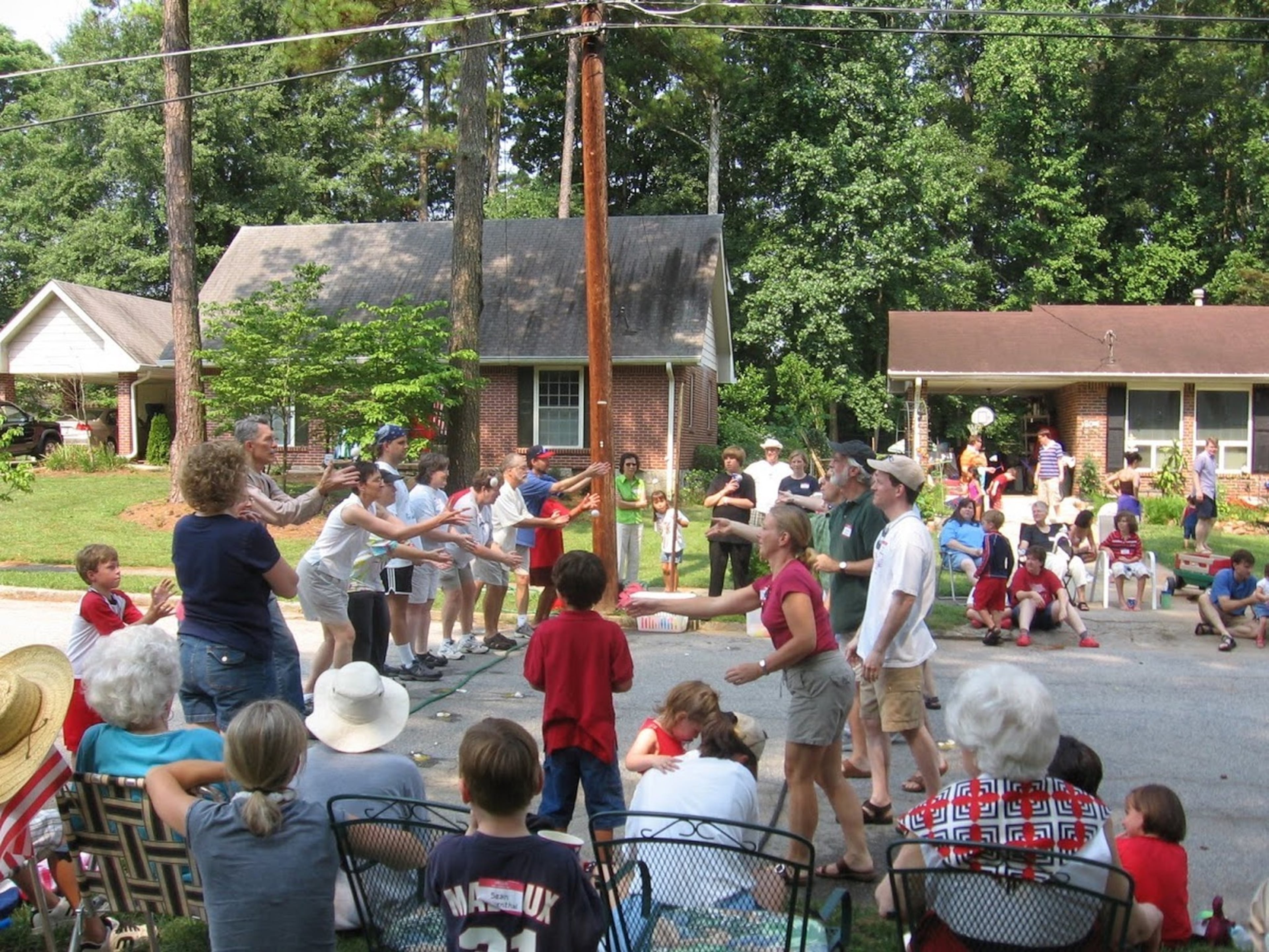 Children’s games and relays were a pre-lunch part of the Faraday Place Fourth of July celebration that ran for 52 years in the Pine Glen neighborhood in greater Decatur. CONTRIBUTED BY CHRIS BRINSON