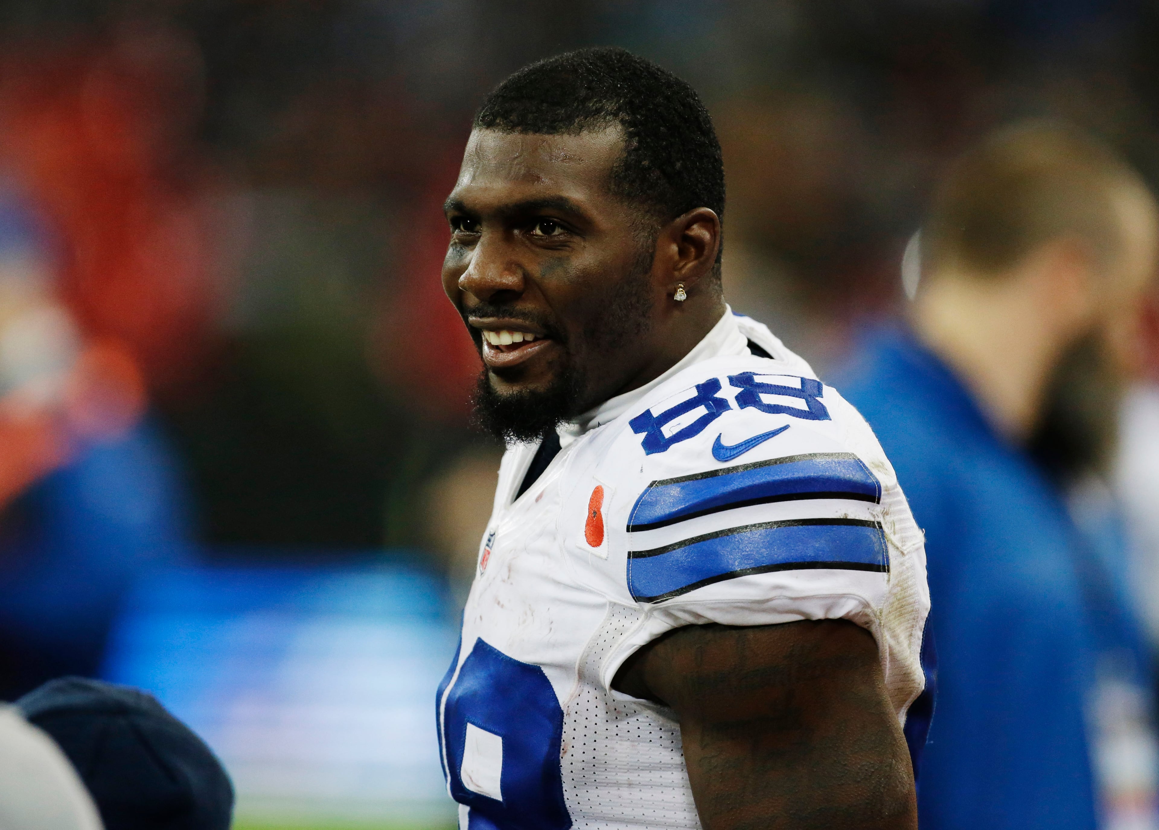 Dallas Cowboys wide receiver Dez Bryant stands on the sidelines during the second half of an NFL football game against the Jacksonville Jaguars at Wembley Stadium, London, Sunday, Nov. 9, 2014. The Cowboys defeated the Jaguars 31-17. (AP Photo/Matt Dunham)