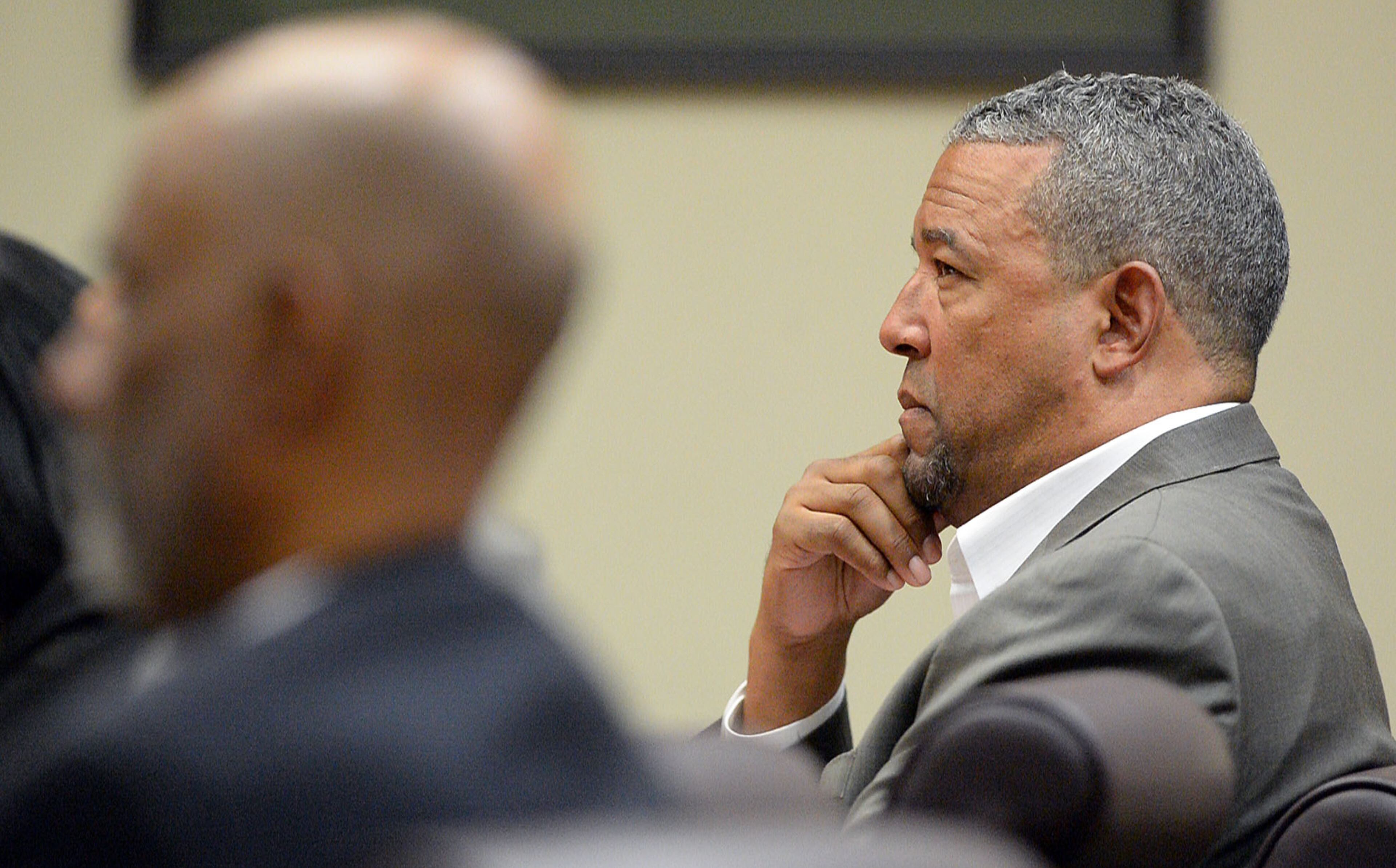 Tony Pope listens as motions are presented. DeKalb County Superior Court Judge Gregory A. Adams presides over a motions hearing for Pat Reid and Tony Pope in their convoluted racketeering case, Tuesday, May 12, 2015. They're asking for a new trial and petitioning to be released from prison awaiting the trial. KENT D. JOHNSON /KDJOHNSON@AJC.COM