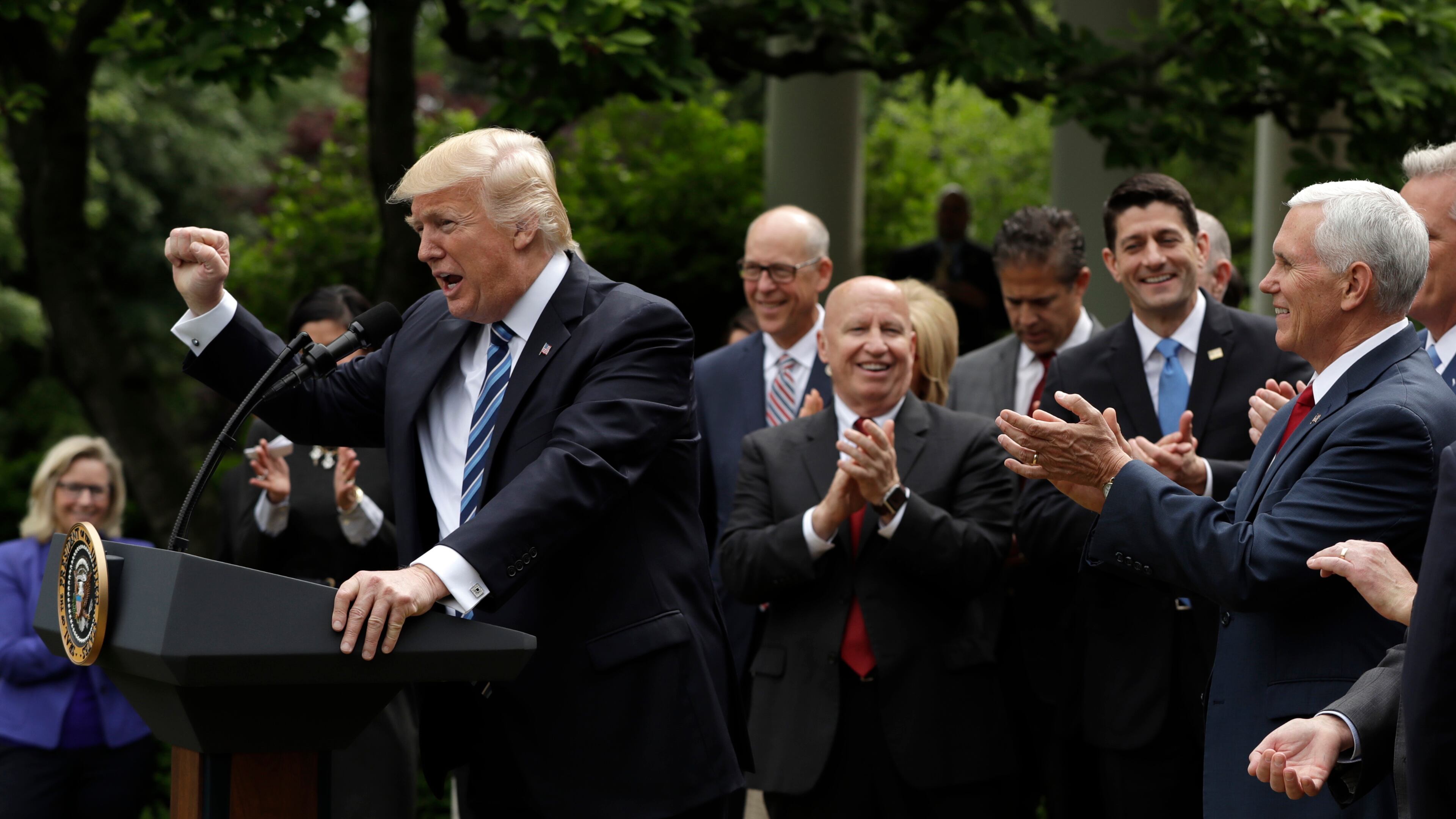 President Donald Trump gestures as he speaks in the Rose Garden of the White House in Washington, Thursday, May 4, 2017, after the House pushed through a health care bill. (AP Photo/Evan Vucci)