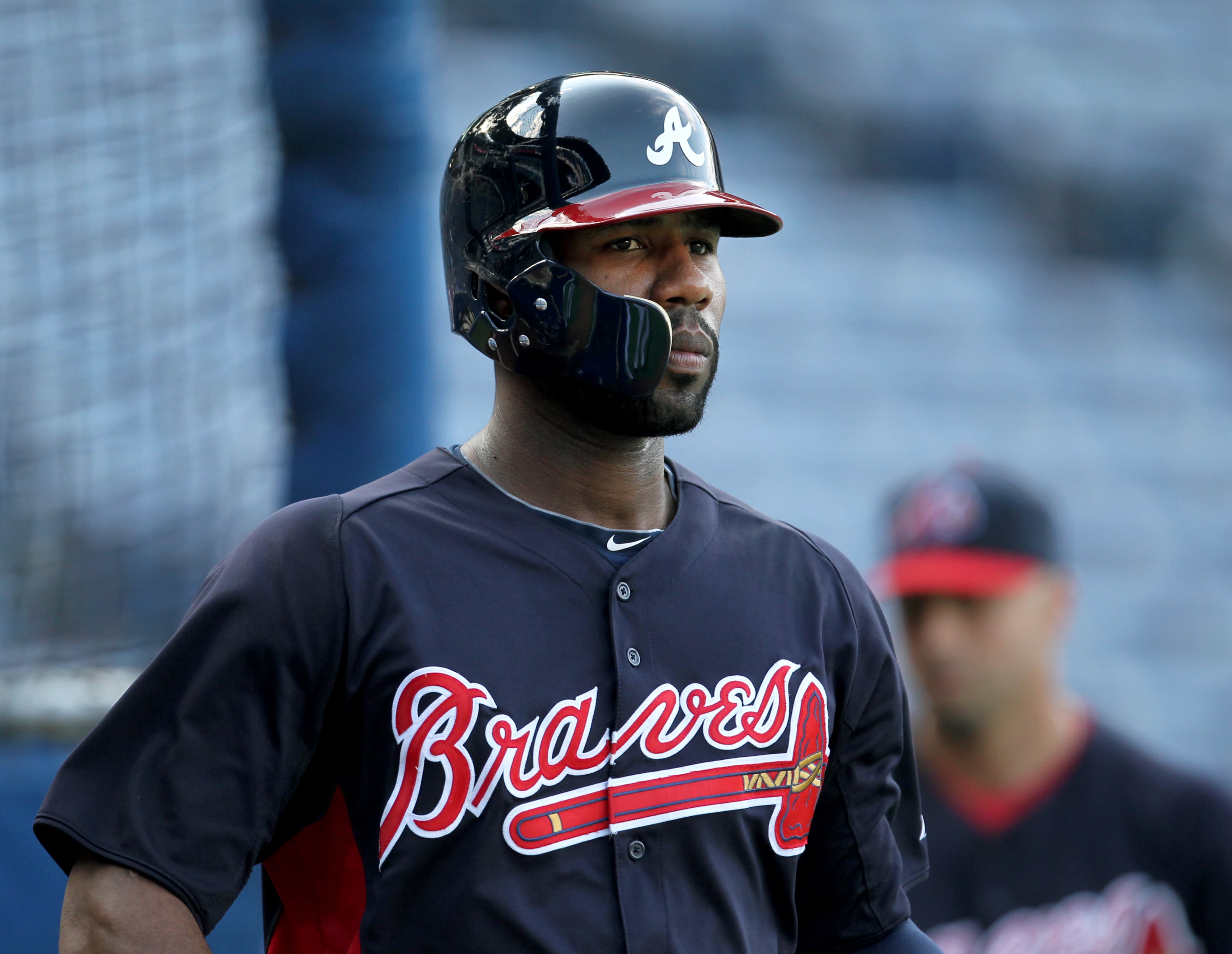 Atlanta Braves outfielder Jason Heyward wears a batting helmet with a protective shield after Heyward hit during batting practice for the first time after getting hit by a pitch before the Braves host the San Diego Padres at Turner Field Friday night in Atlanta, Ga., September 13, 2013. On August 21, 2013, Heyward was struck in the right jaw by a fastball from New York Mets pitcher Jonathon Niese. The injury required a surgery inserting two plates to stabilize the two fractures in his jaw.