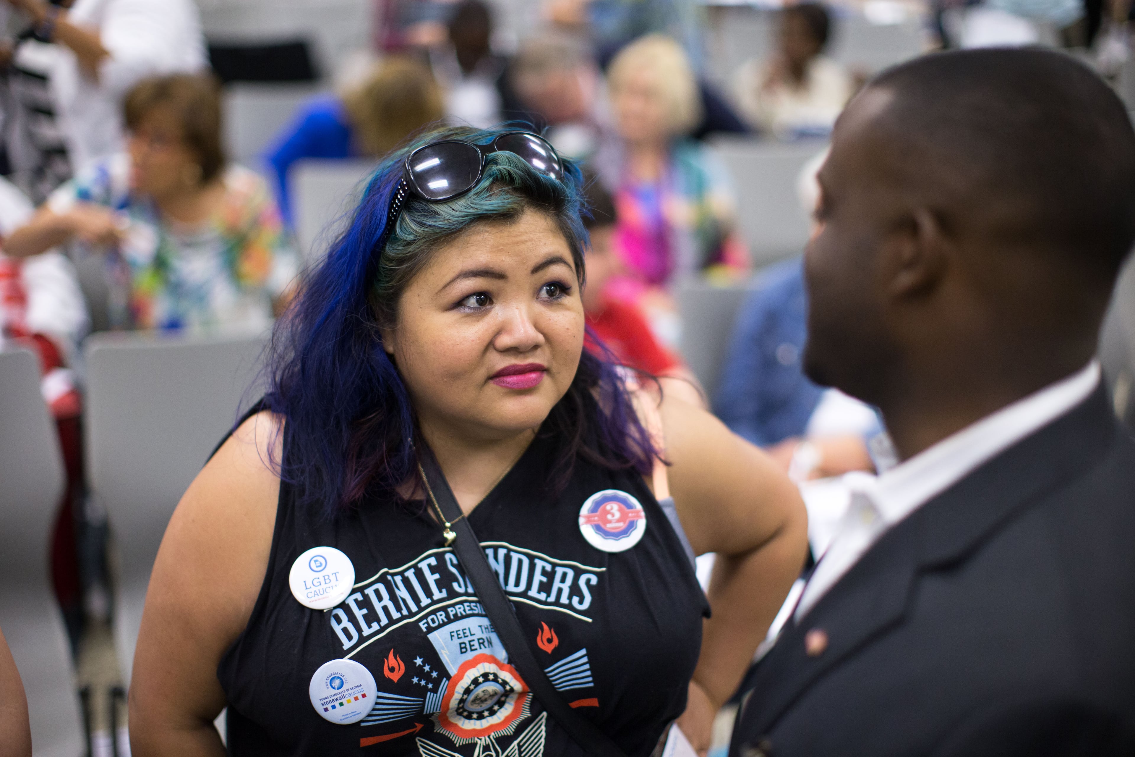 Jen Rafanan, left, supporter of Democratic presidential candidate Bernie Sanders, speaks with Daniel Blackman at the IBEW Local 613 Auditorium, Saturday, June 11, 2016, in Atlanta. Members of the Georgia Democratic Party gathered to elect at-large and alternate delegates to the Democratic National Convention in Philadelphia. BRANDEN CAMP/SPECIAL