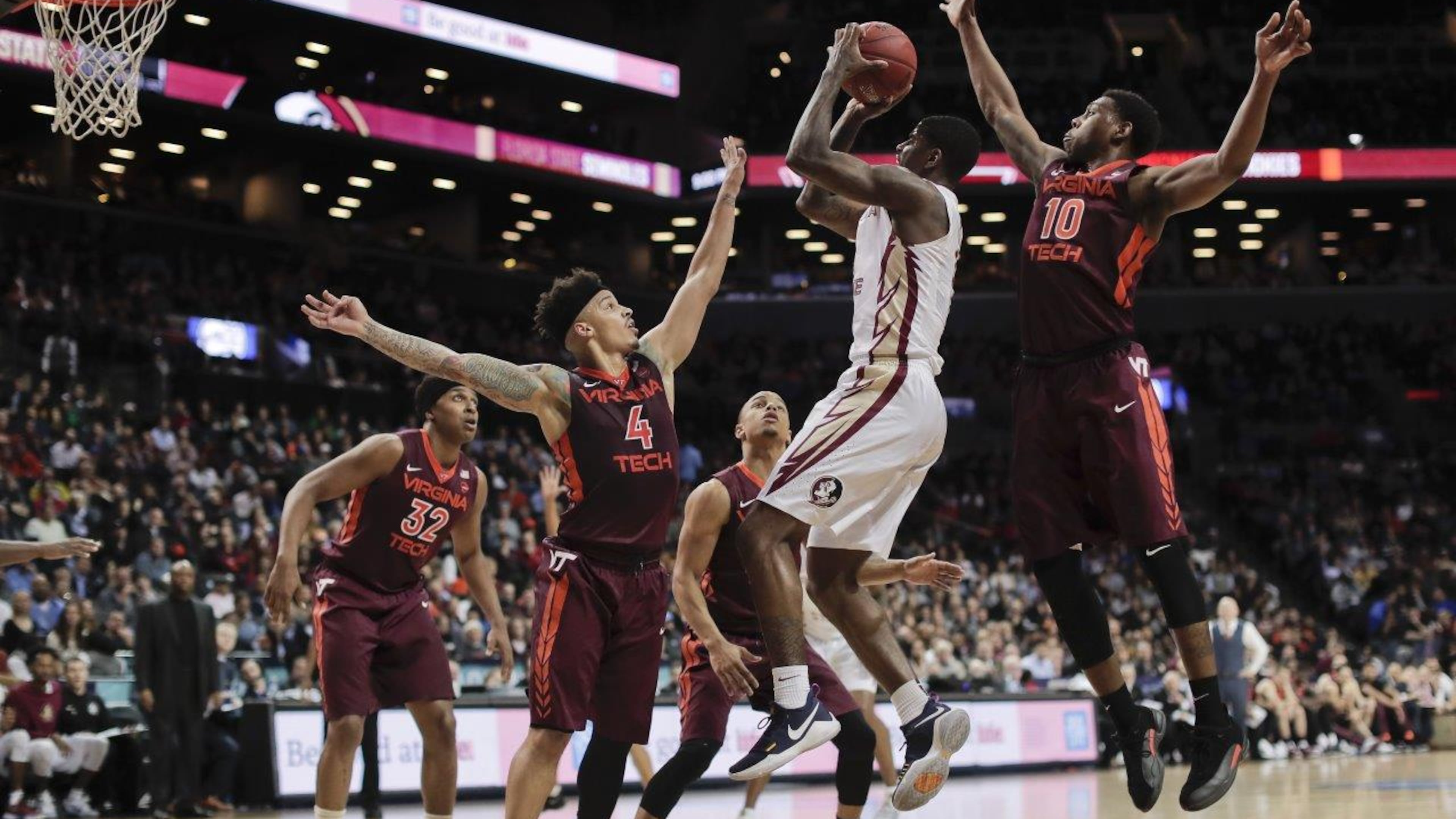 Florida State guard Dwayne Bacon (4) puts up a shot against Virginia Tech in the second half of an NCAA college basketball game during the quarterfinals of the Atlantic Coast Conference tournament, Thursday, March 9, 2017, in New York. Florida State won 74-68.(AP Photo/Julie Jacobson)